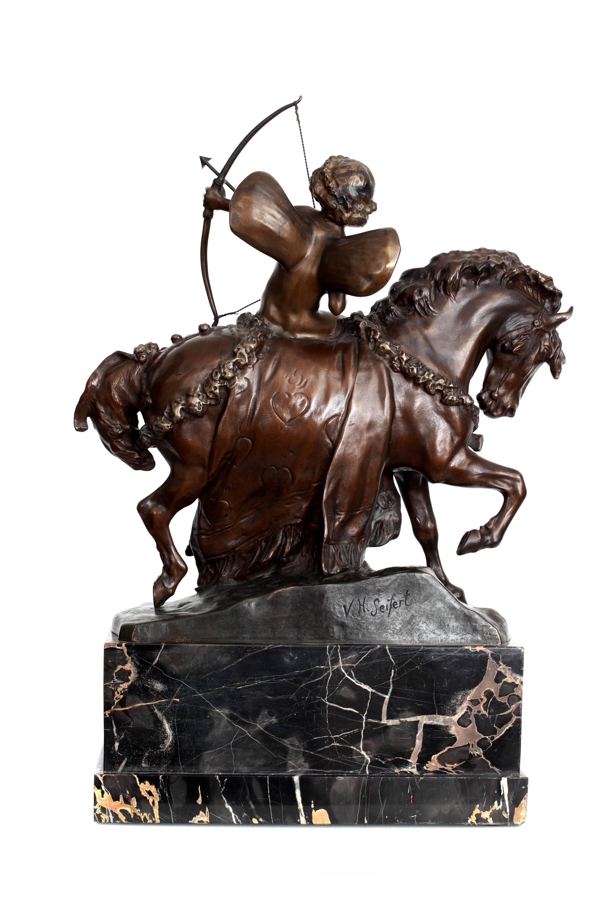 Bronze Horseback Riding Amor Armed with a Bow and Aiming his Arrow  For Sale