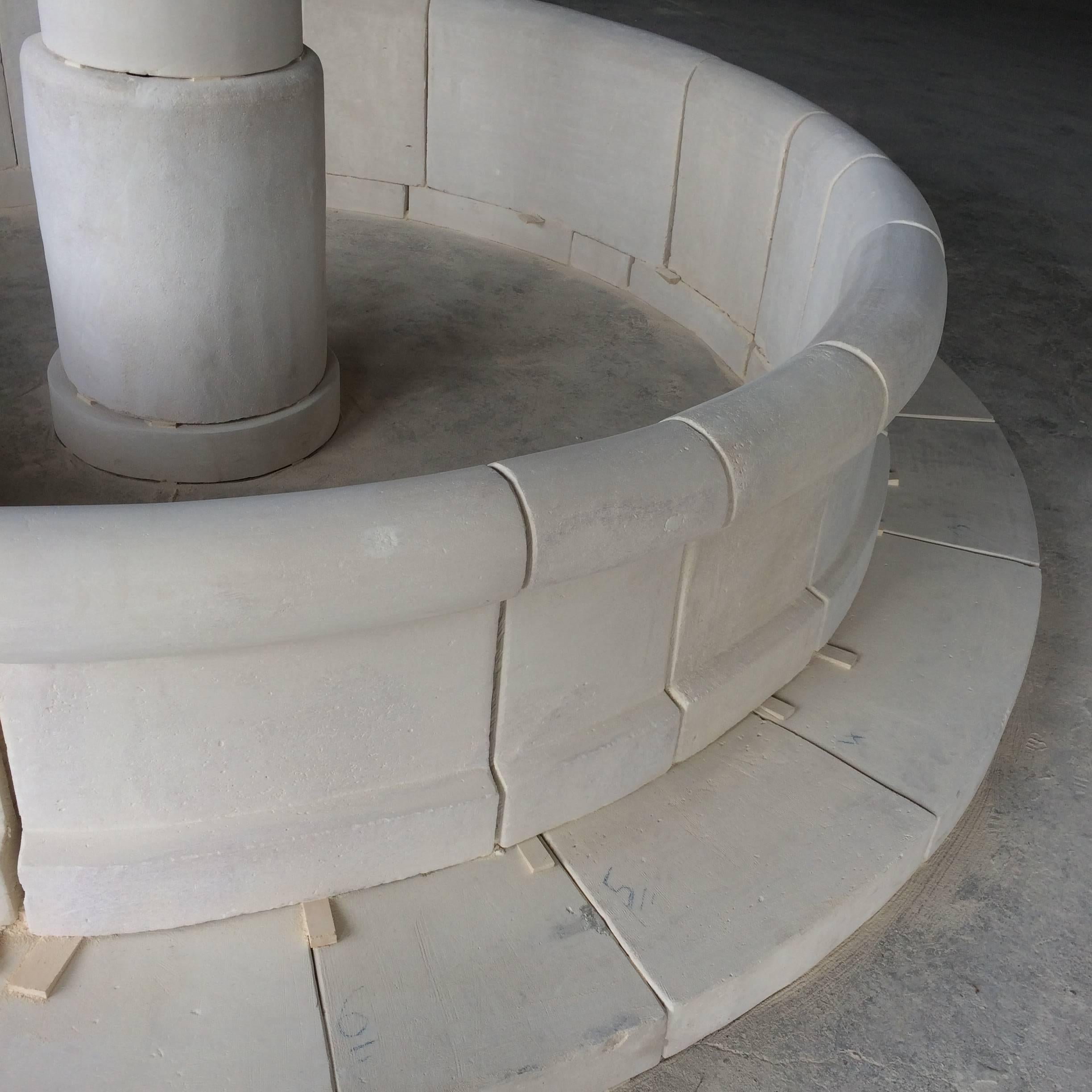 A large and massive French Louis XIV style round fountain in pure French limestone, handcrafted as the old French tradition, piece by piece from old blocks of French limestone. 21st Century, France.

Handfinish, very massive and solid limestone from