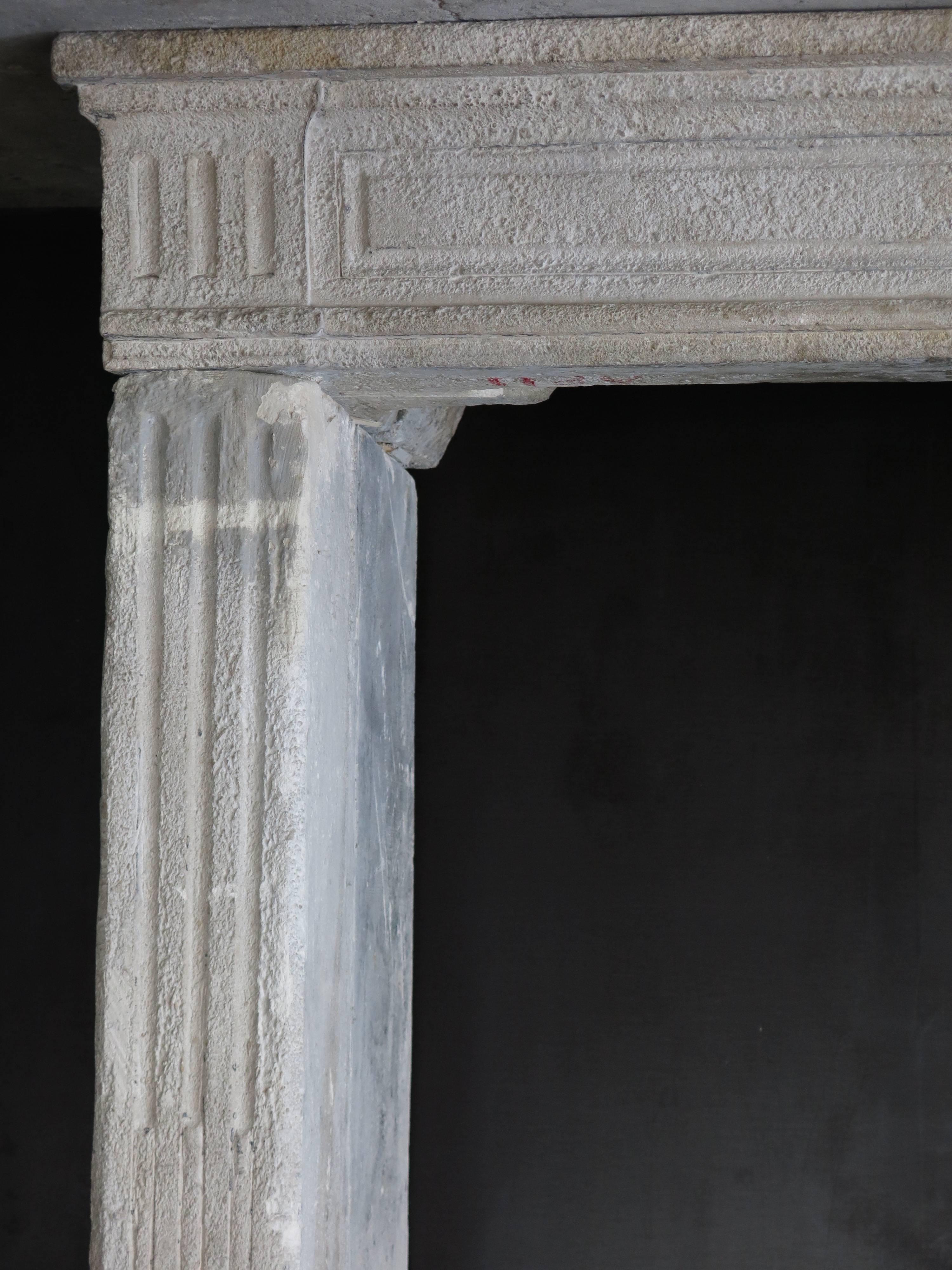18th Century and Earlier Original French Louis XVI Period Limestone Fireplace, circa 1790s, France For Sale