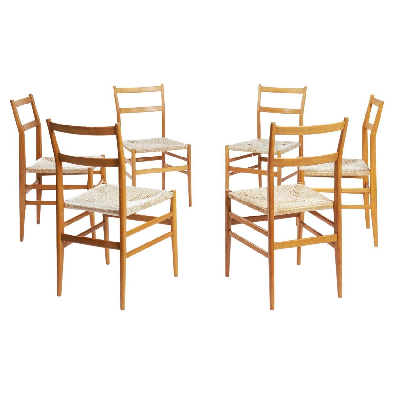 Set of 6 blonde Leggerera chairs by Gio Ponti, designed in 1954. This set is an early verion and manufactured in 1956. (labeled)

These iconic and very comforable chairs by Gio Ponti represent a masterpiece of Italian design, combining lightness and