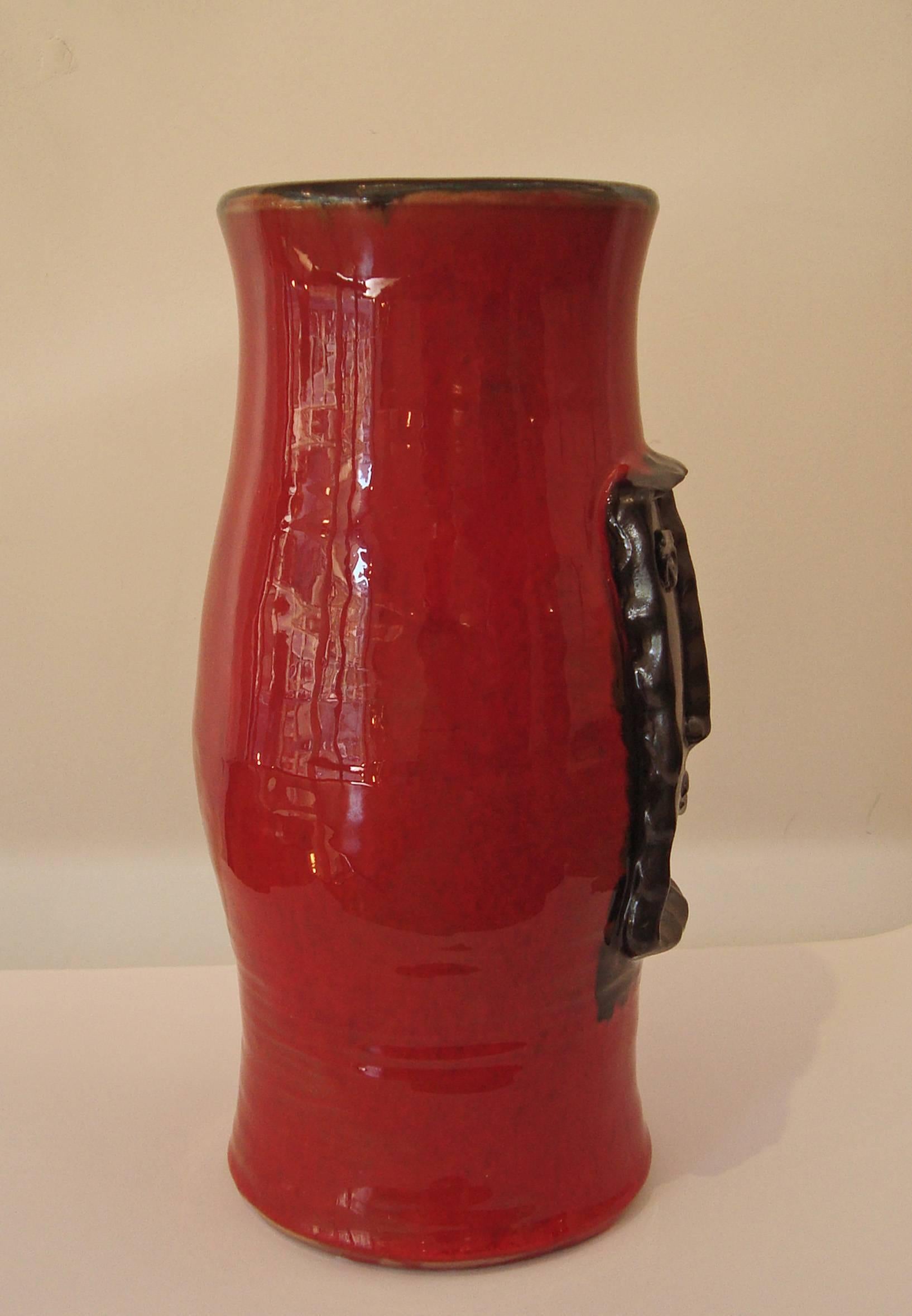 Mid-Century Modern Red Vase with Black Relied Head, by Cloutier Brothers