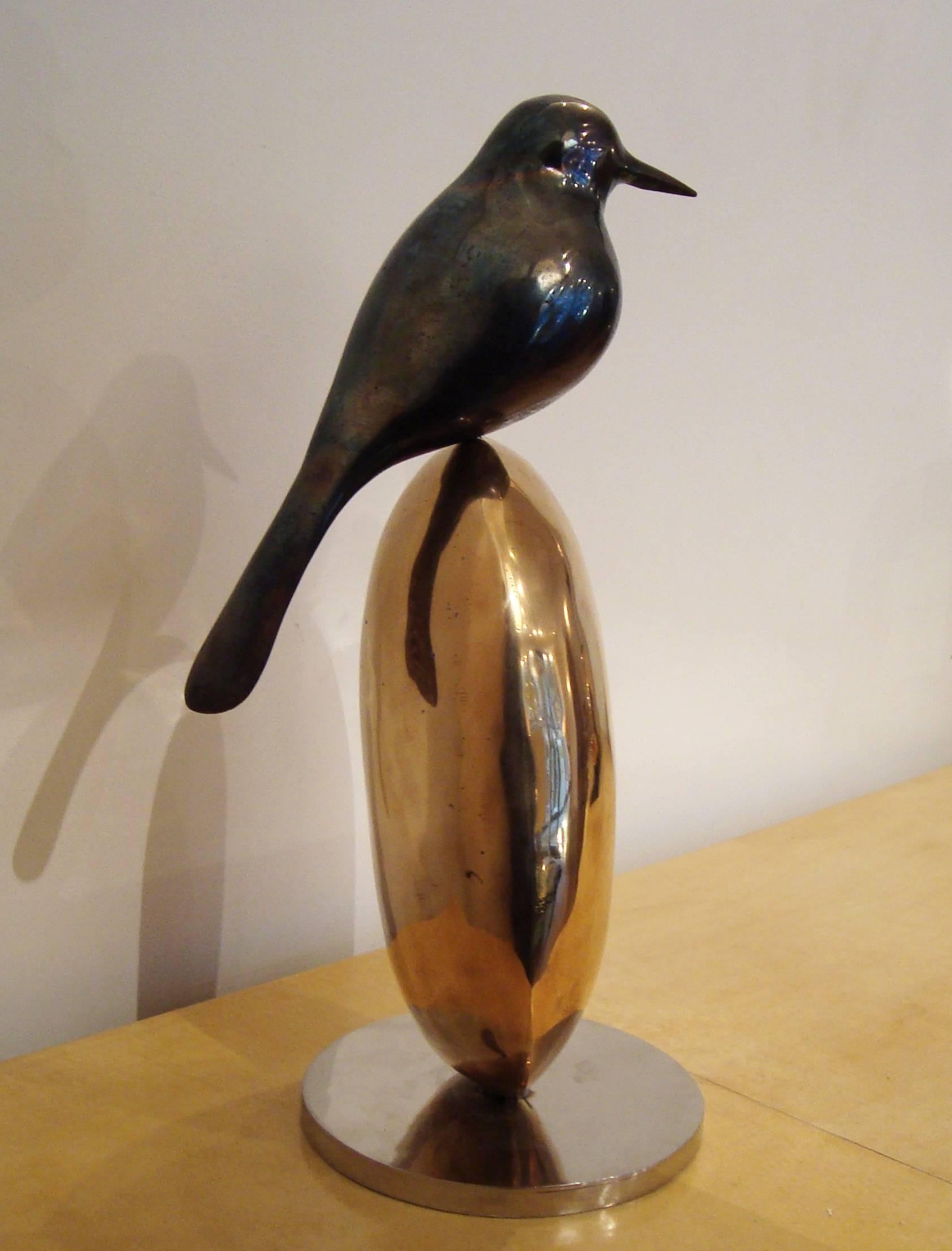 Beautiful bronze sculpture of a bird on rock, circa 1980, by R.Broissand (1928-).
Looks like a big blackbird. 
Patinated and gilt polished bronze. Circular base. 
Signed 