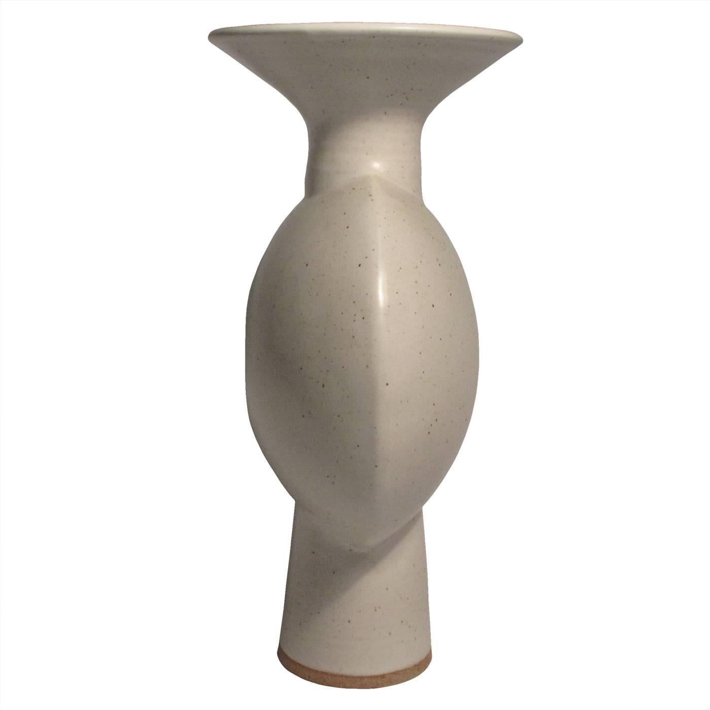 A large off-white speckled glaze ceramic sculptural vase. For decorative purposes only. Signed by the artist.