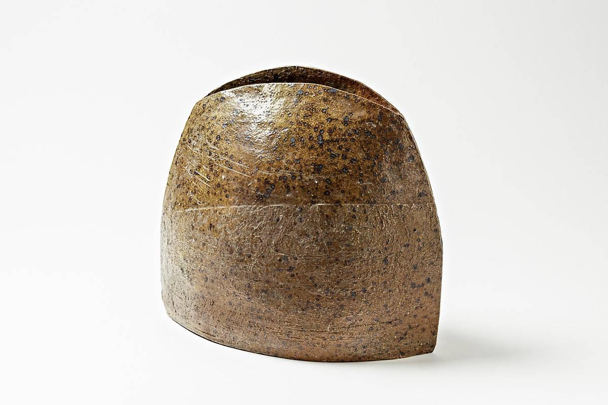 Gustave Tiffoche

Elegant stoneware ceramic vase called 