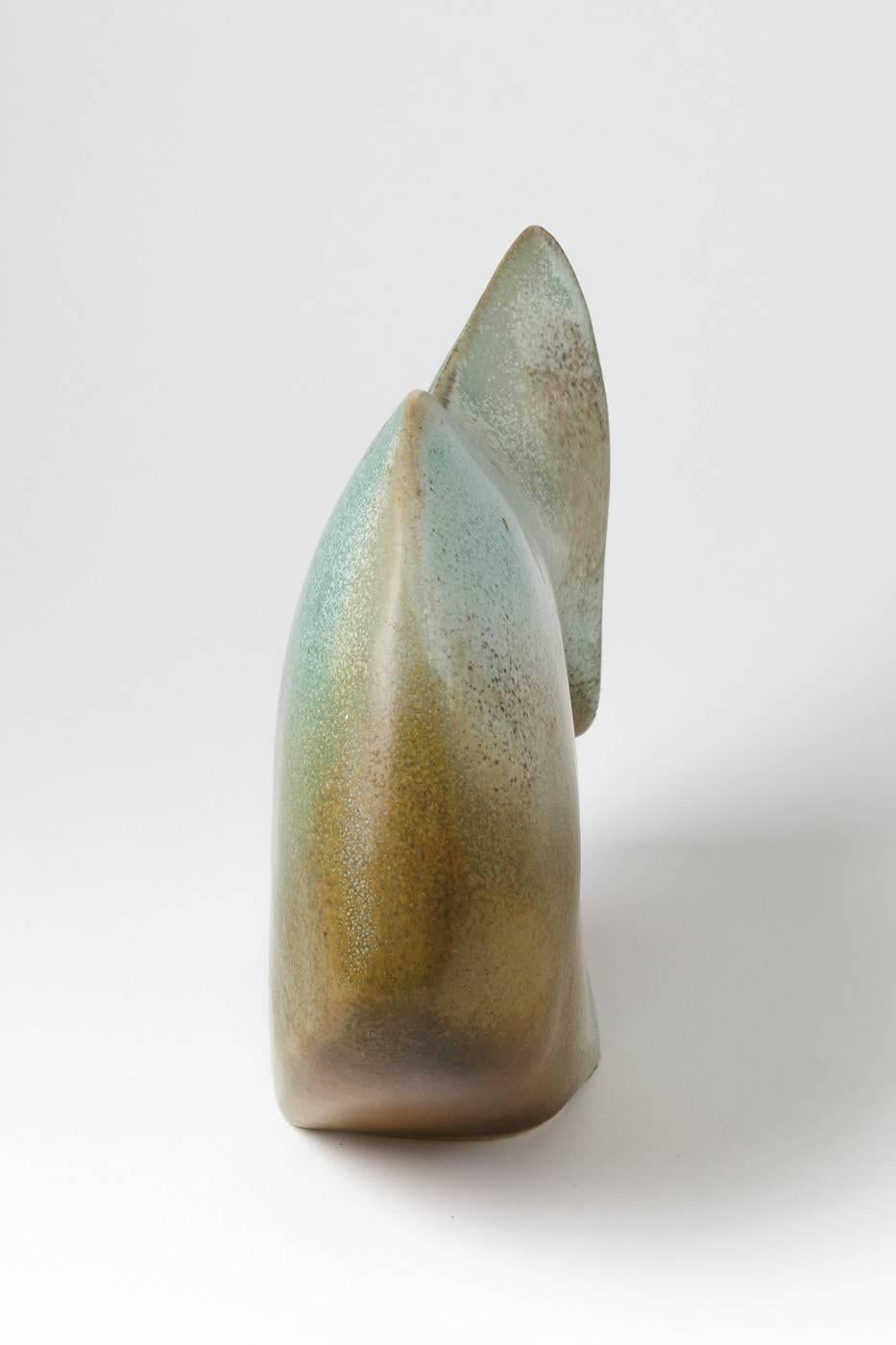 Elegante pesce dell'artista Tim Orr.

Scultura in porcellana con smalto ceramico blu turchese.

circa 1970, firmata sotto la base.