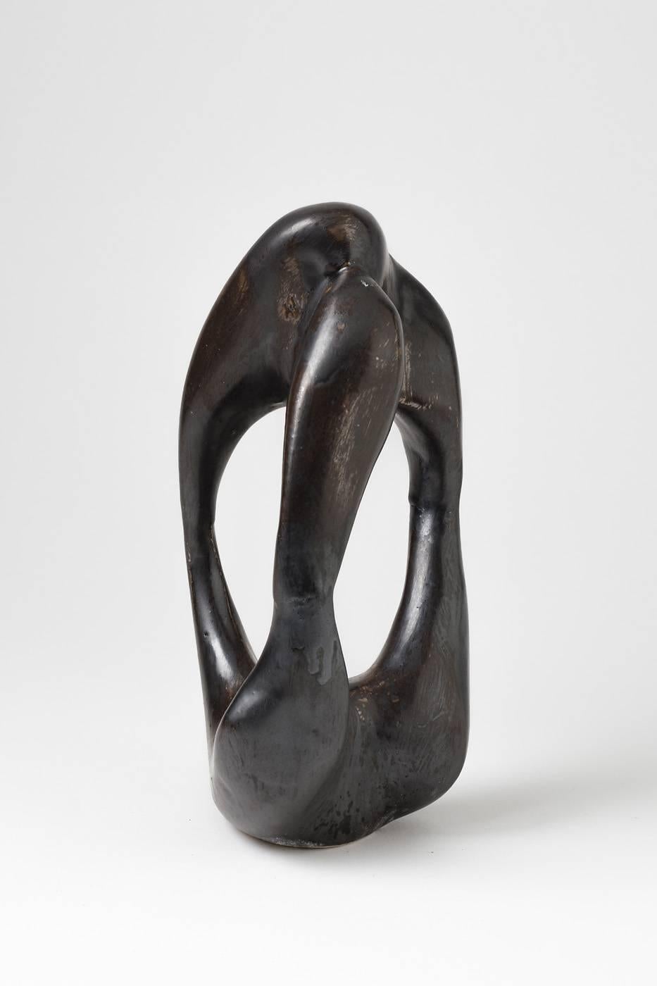 Tim Orr

circa 1970, signed under the base.

Incredible abstract porcelain form with beautiful black ceramic glaze.

          