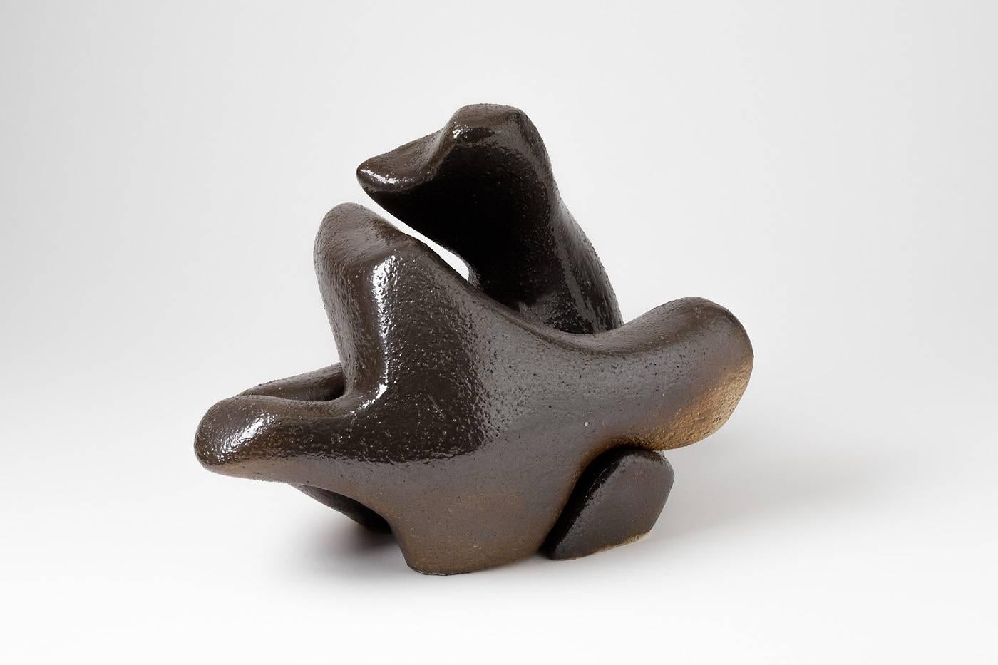 Elegant stoneware abstract sculpture by Tim Orr.

circa 1970

Beautiful black ceramic glaze.

Perfect conditions, signed under the base.