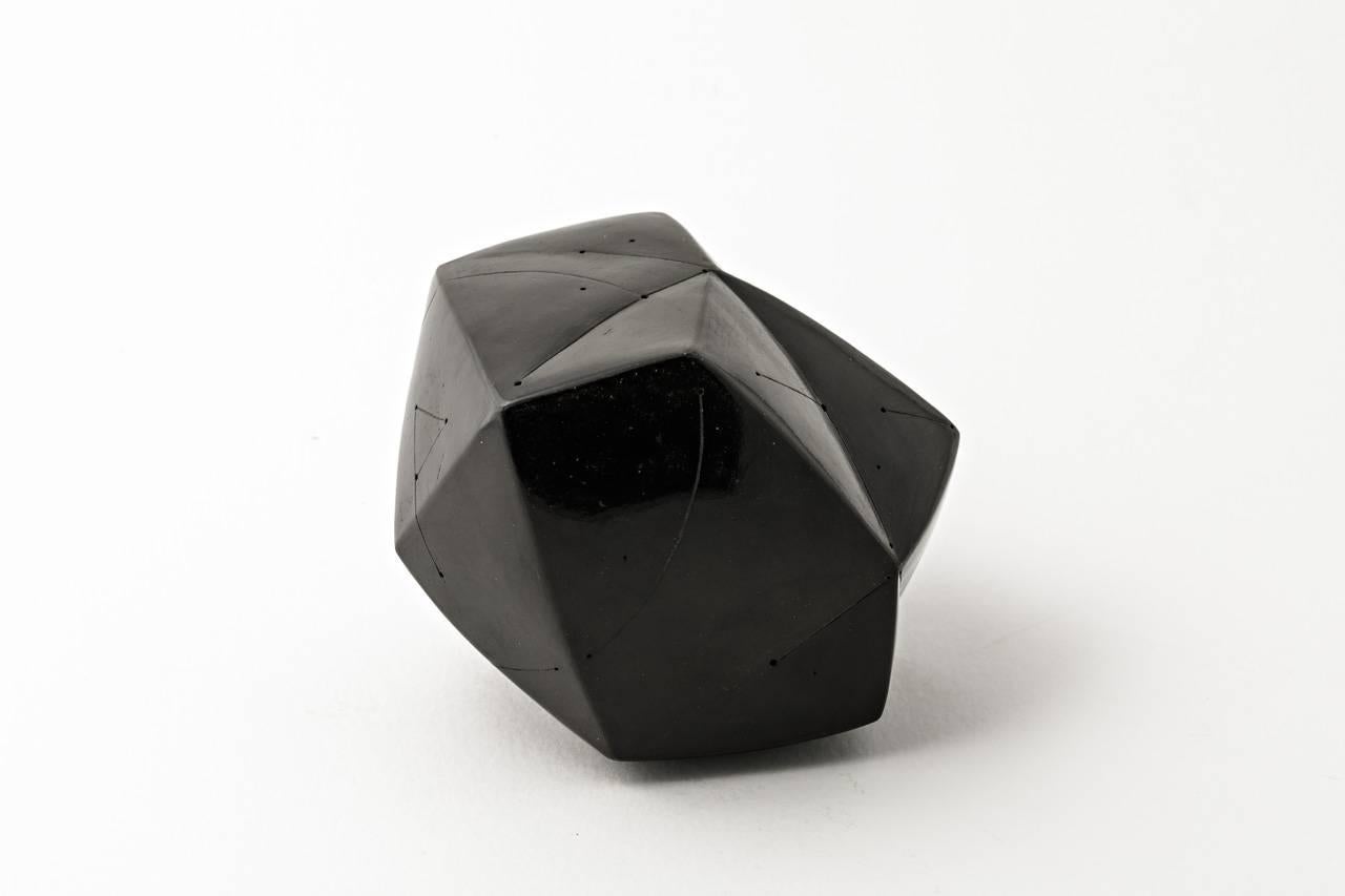 Elegant abstract sculpture by Nadia Pasquer.

Beautiful black ceramic glaze with matte en shiny effects.

Signed under the base.

The name of the sculpture realised in 2015 is 
