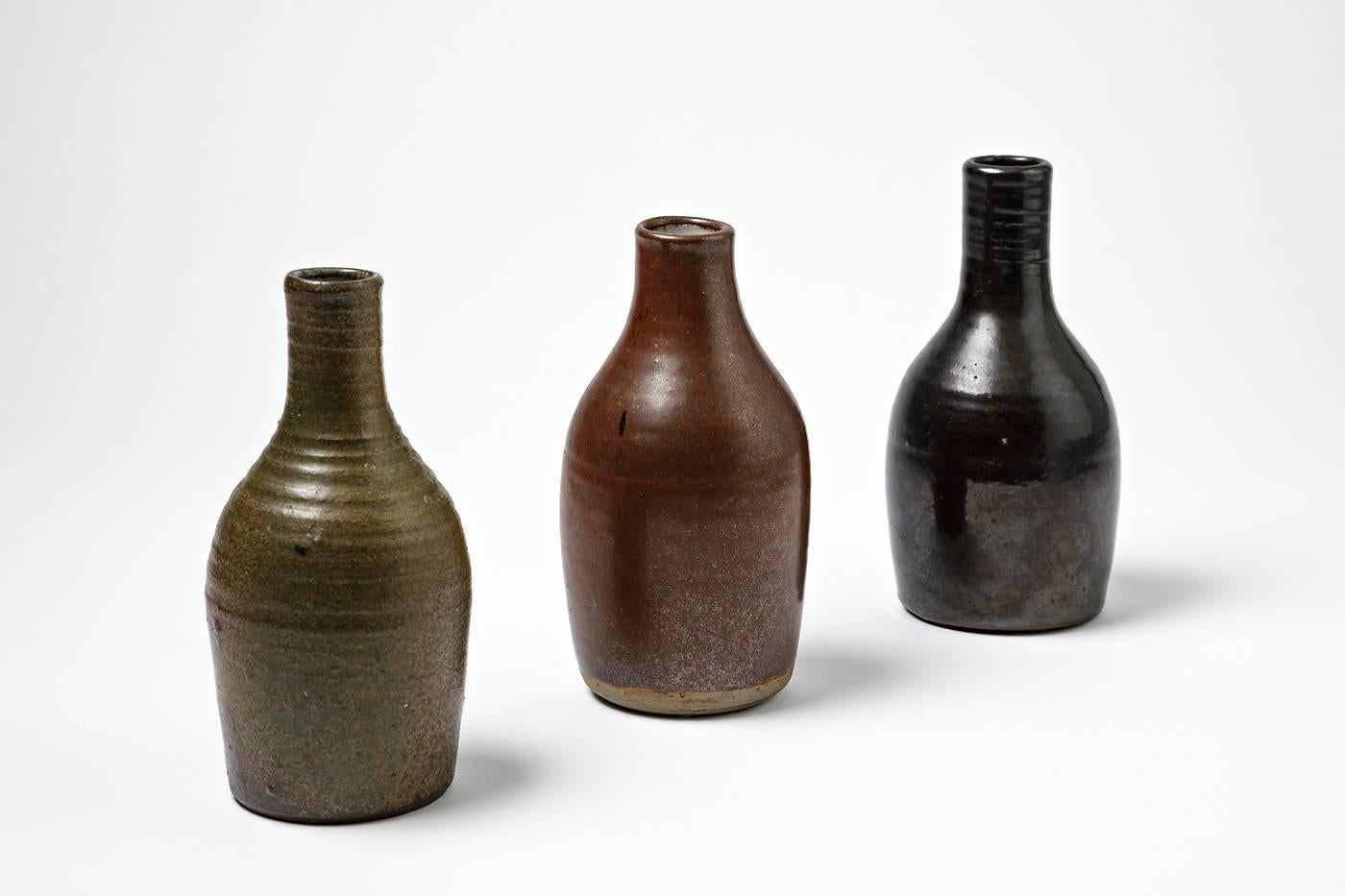 Norbert Pierlot

Very nice set of three ceramic vases by the French artist Norbert Pierlot in Ratilly.

Beautiful ceramic black, red and green glaze.

All pieces are signed in the base.

Dimensions: black 17 x 7cm / red 16.5 x 7cm / green 15