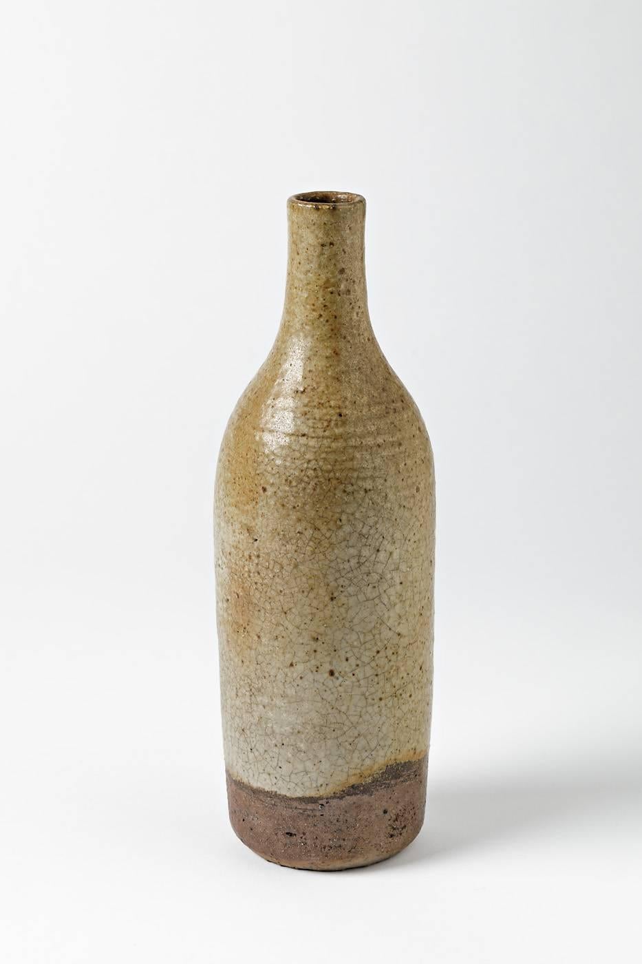 Jeanne and Norbert Pierlot 

Elegant ceramic bottle, circa 1950.

Beautiful brown glaze, signed under the base.

Perfect condition.