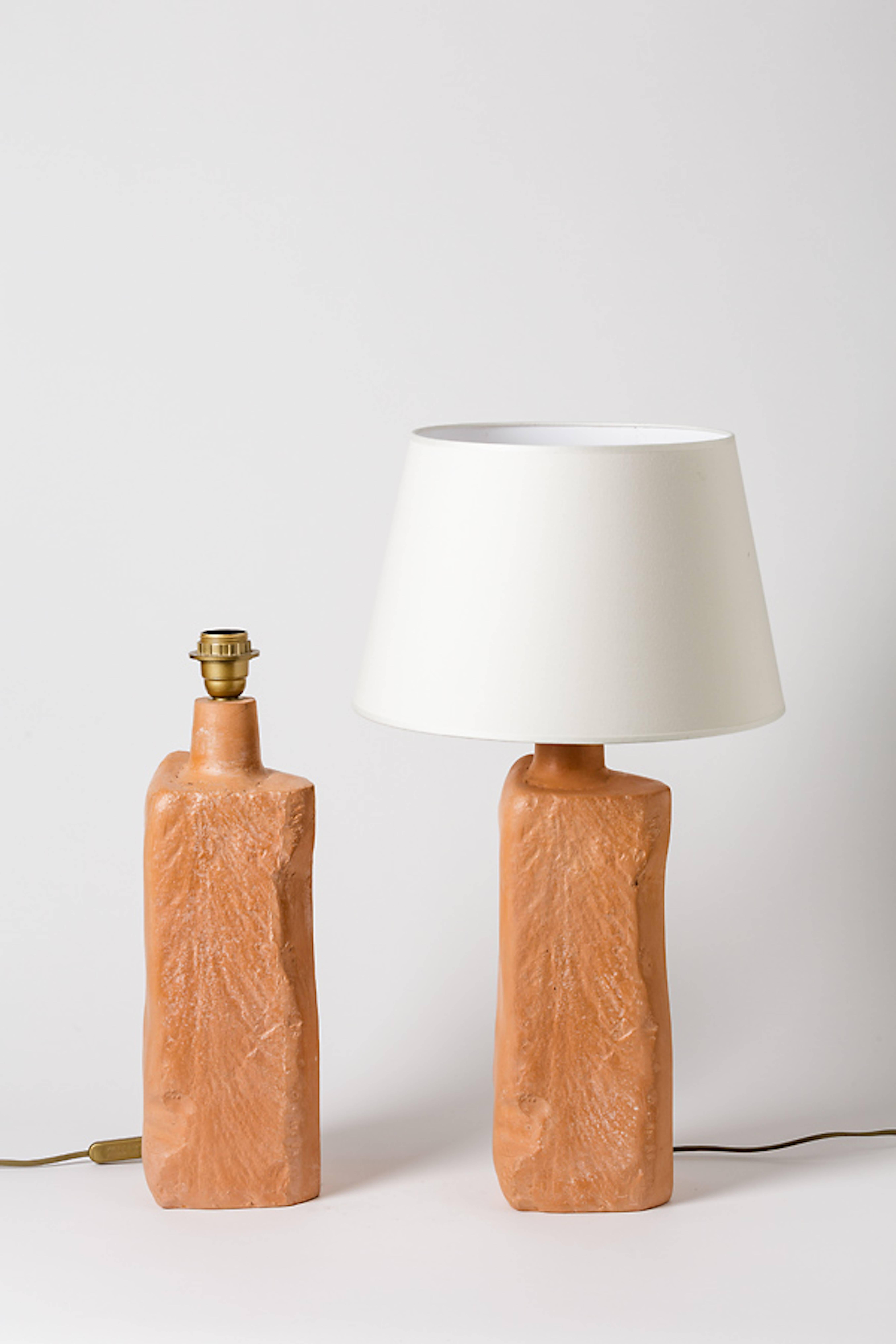 An elegant pair of ceramic lamps by Tim Orr.
Perfect original conditions.
Signed 