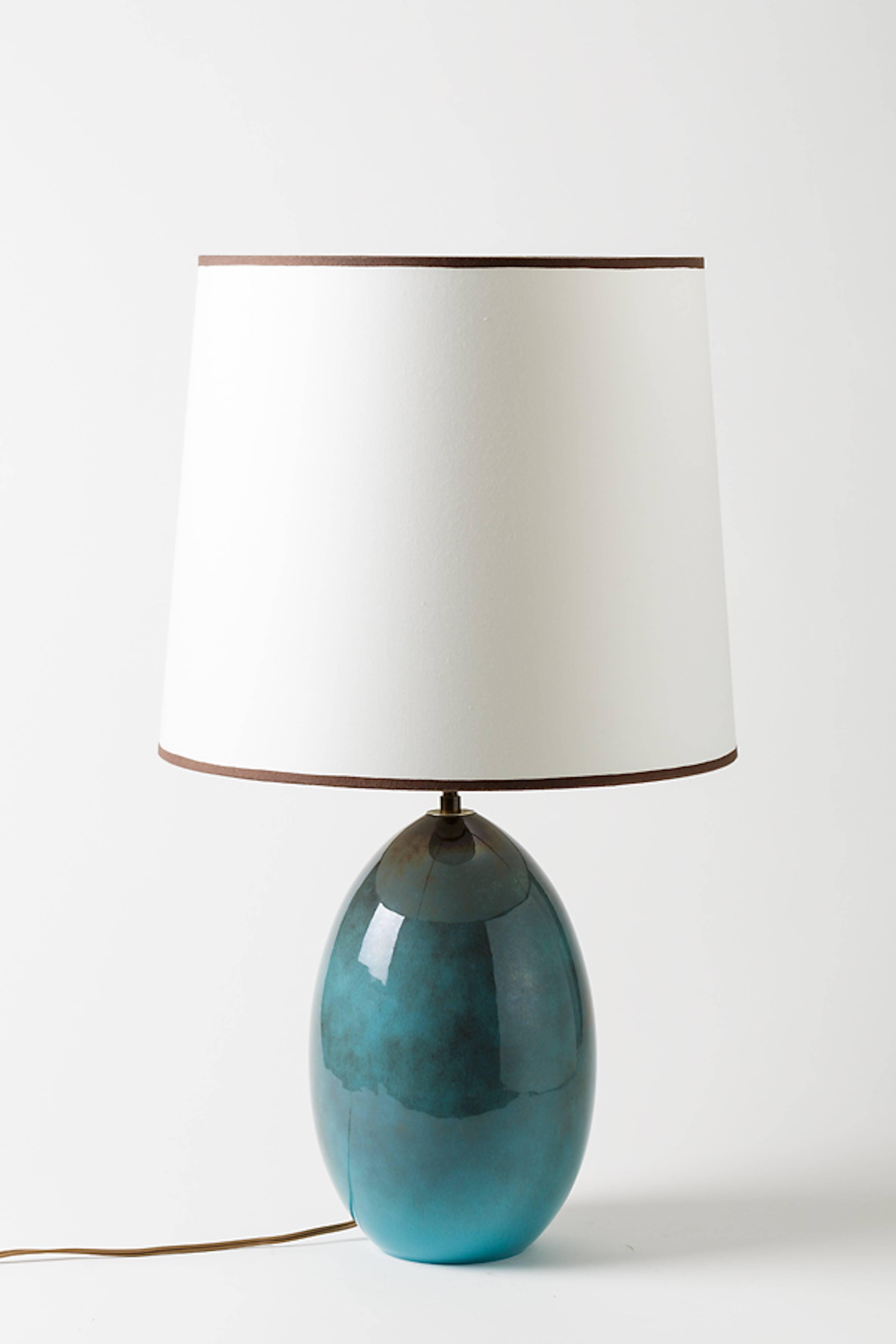 A ceramic lamp by Gabriel Musarra, Vallauris, circa 1960-1970.
Perfect original conditions.
Sold with lamp shade and new European electrical system.

Diameter: 15 cm / 6' inch.

Height (ceramic only): 28 cm / 11' inch.

Height (ceramic and