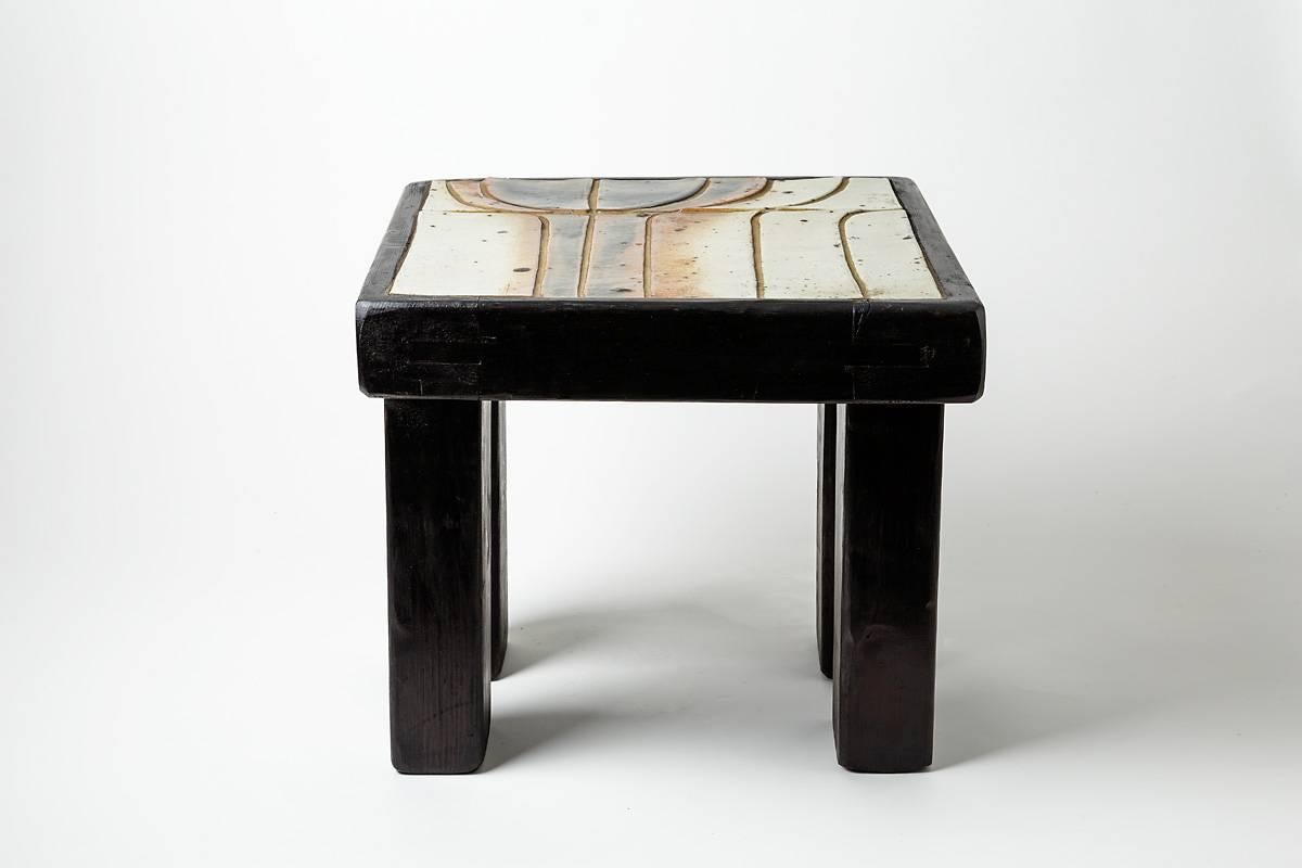A rare sofa table with a ceramic top attributed to Pierre Mestre, La Borne,
circa 1970.
Wood structure.