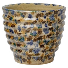 Maceta o cubeta decorativa de cerámica de estilo art déco del siglo XX, en tonos azules y marrones, de Lucien Talbot