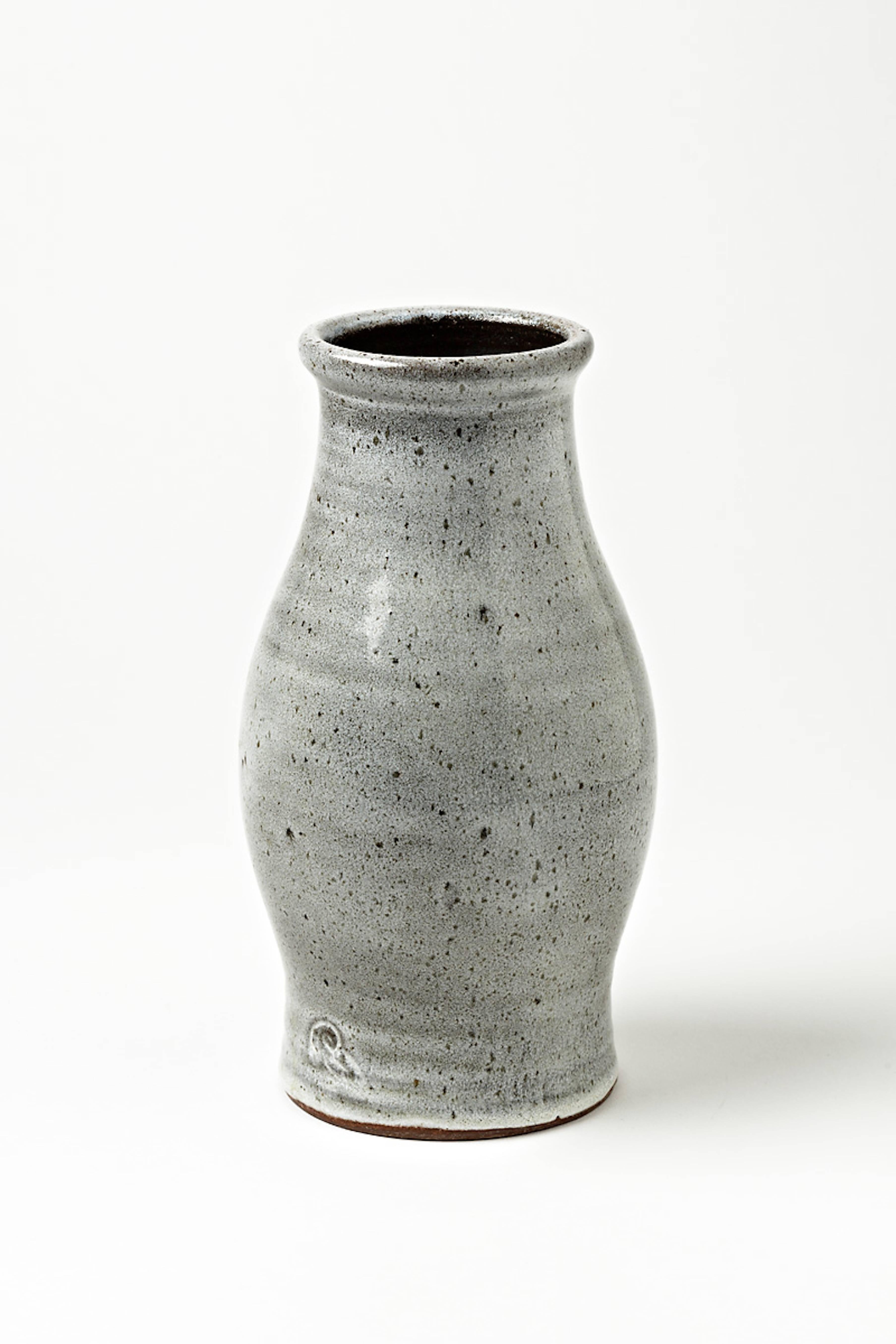 A stoneware vase with white glaze decoration by the workshop Pierlot, Ratilly, France.
Signature at the base.
Perfect original conditions,
circa 1980-1990.