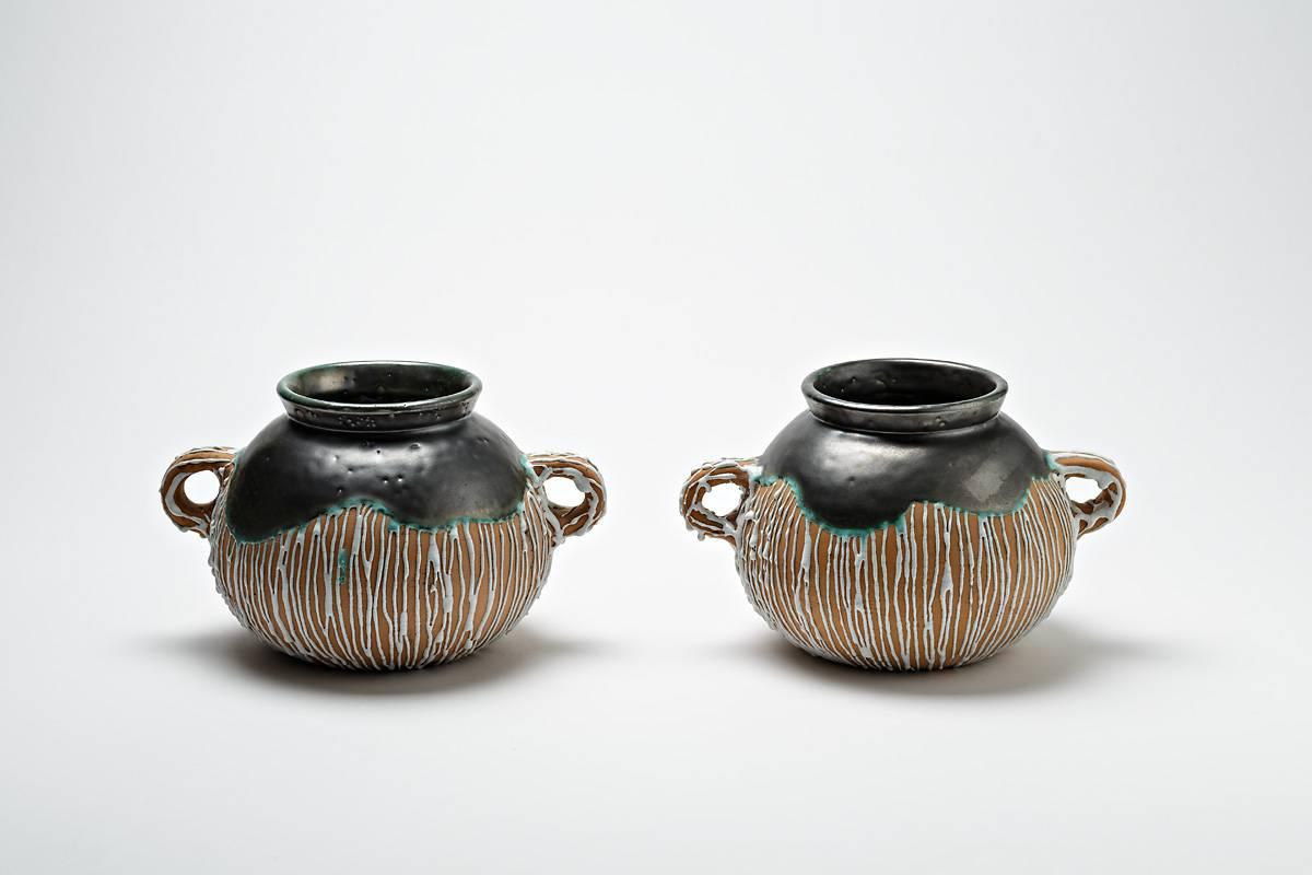 A rare pair of ceramic vases by CAB for Primavera with white, black and green glazes decorations.
Perfect original conditions.
Signed under the base.
circa 1930.
