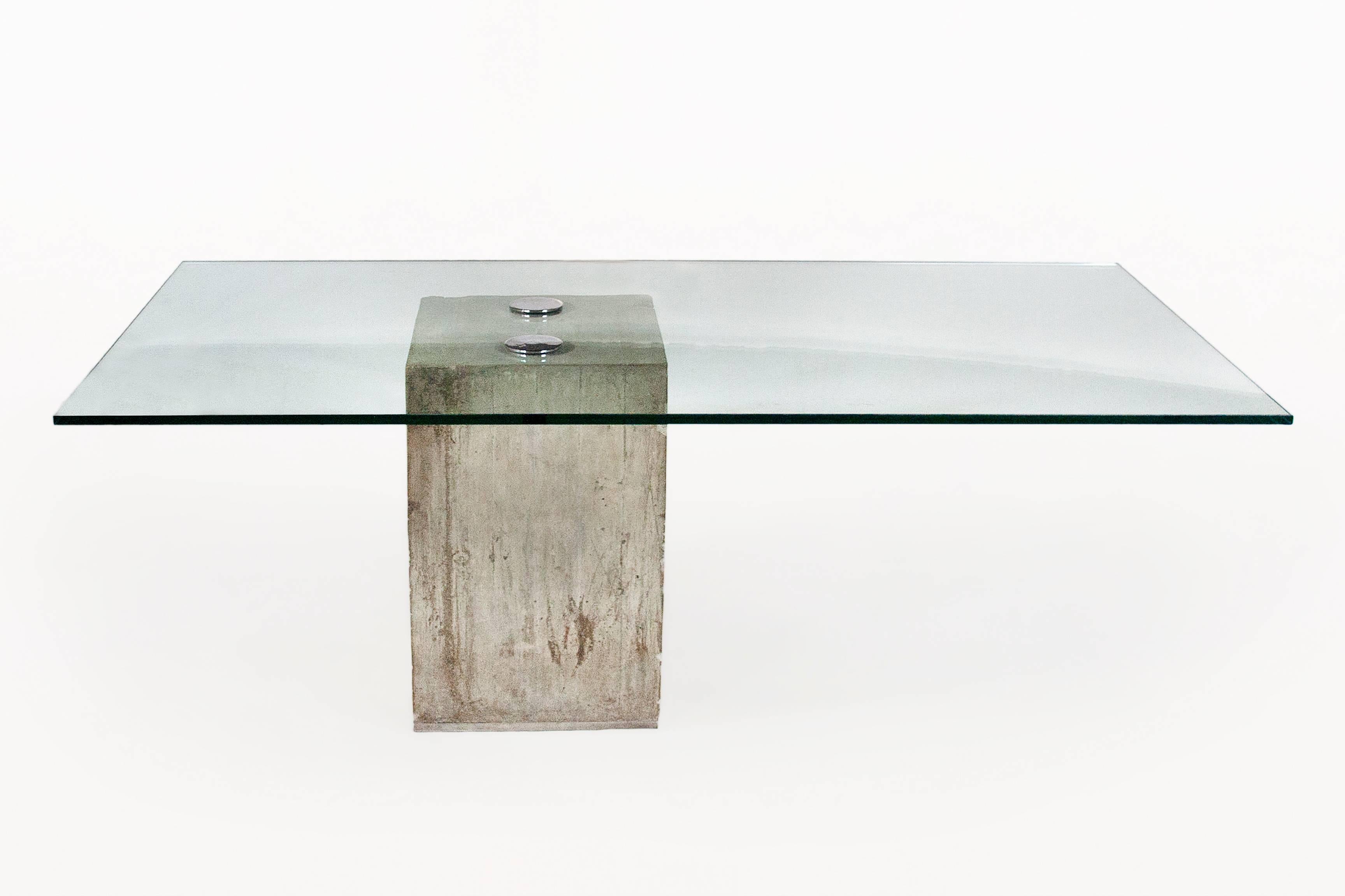 Glass and concrete dining table by Sergio & Giorgio Saporiti
Cast concrete base and glass top with chrome Knobs
Wear on the concrete base
circa 1970, Italy
Very good vintage condition.