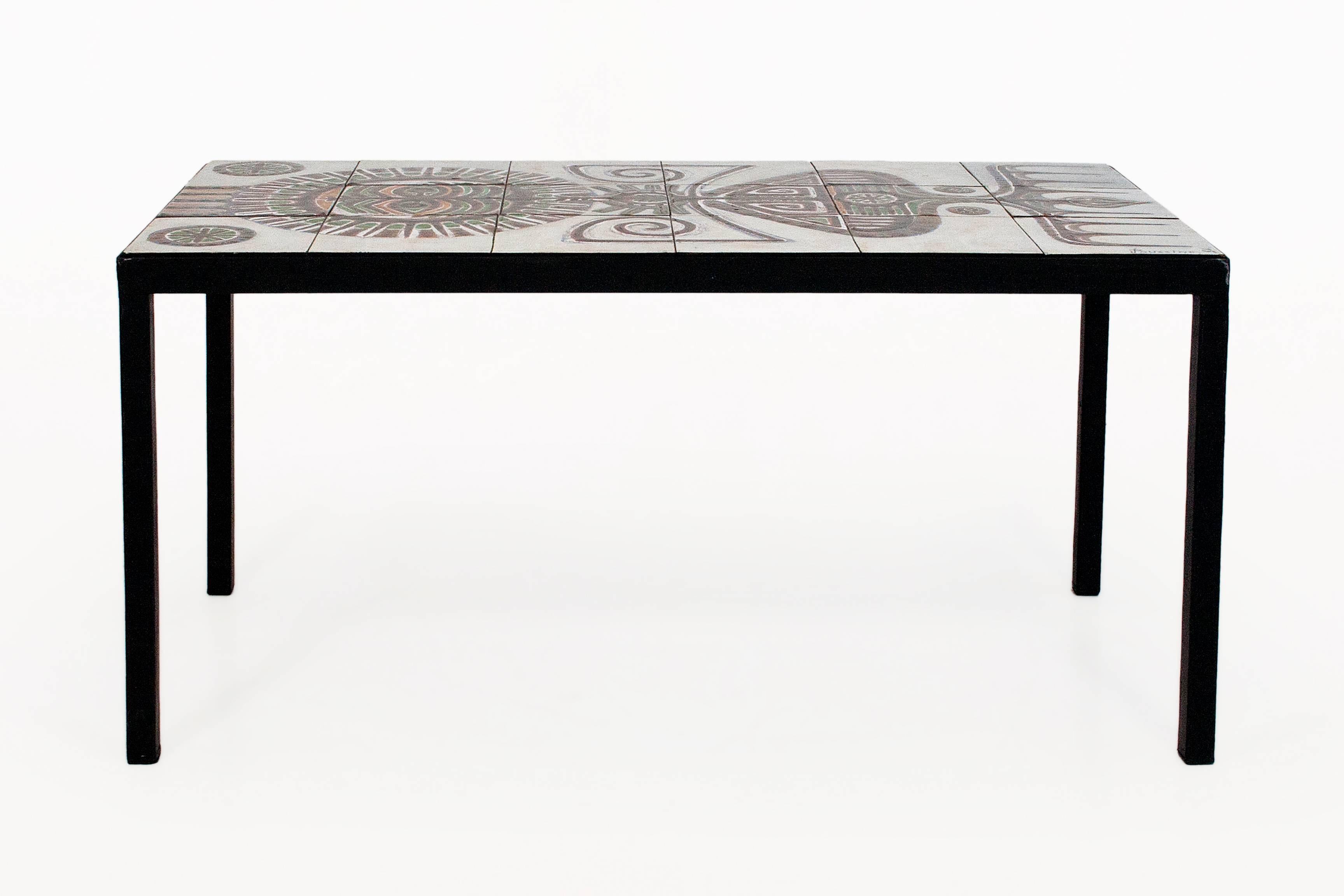 Ceramic coffee table by Jacques Poussine for Sant Vincens
Metal base
Ceramic tile top with organic motifs
Signed
France, circa 1960
Very good vintage condition.