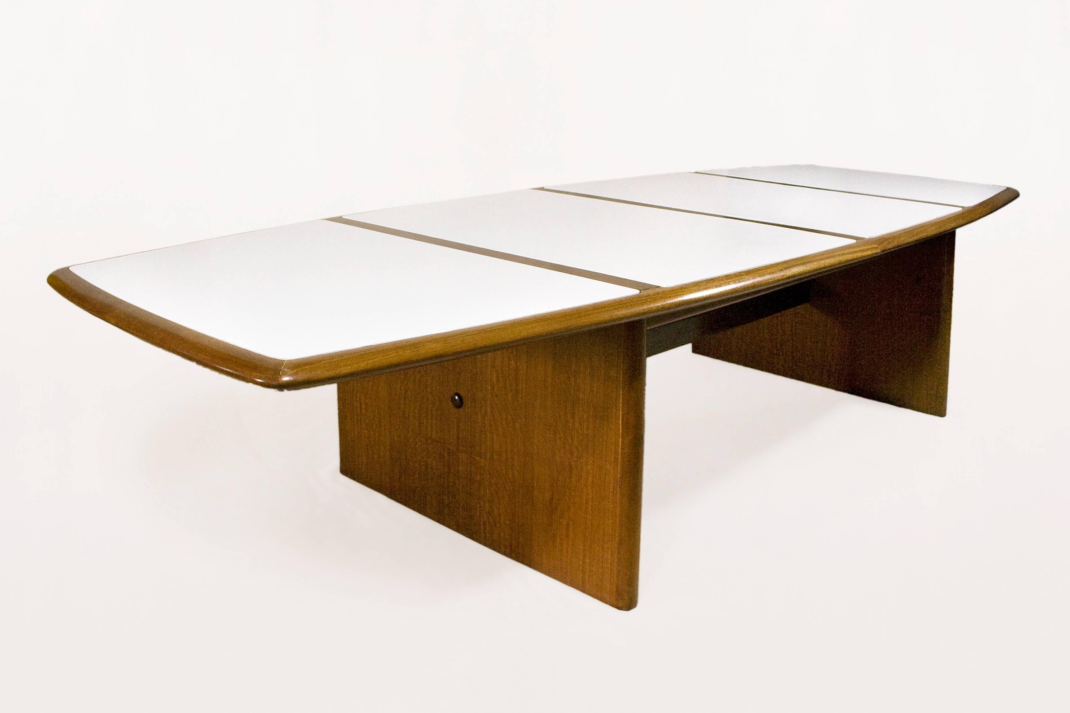 Monumental, Modern Danish dining table.
Exceptional size.
Teak wood and white Formica.
circa 1960, Denmark.
Excellent vintage condition.