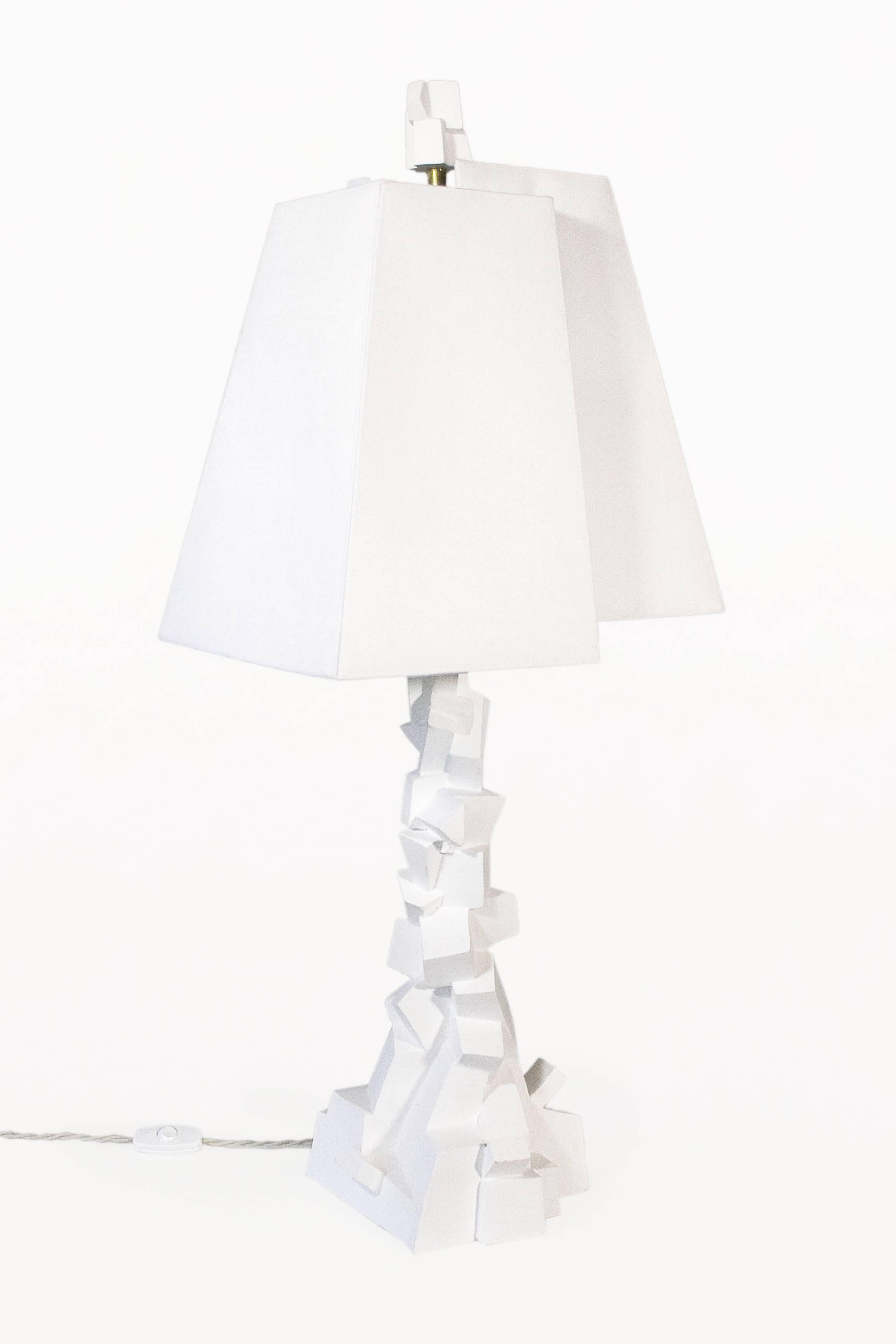 Pair of Brutalist table lamps by Jean-Jacques Darbaud.
Sculpted plaster brutalist base and lampshade.
Beautiful Darbaud design.
Limited edition.
circa 2015, France.
Very good condition.
