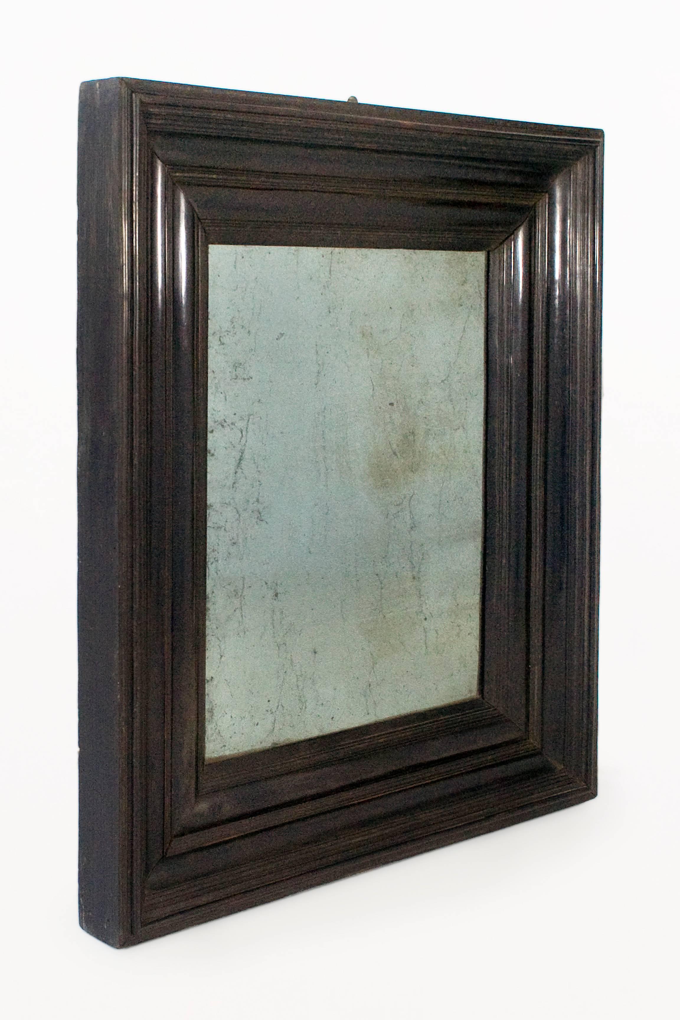 Large black ebony Lombardia mirror
with original mirror
circa 1800, Italy
Very good vintage condition.