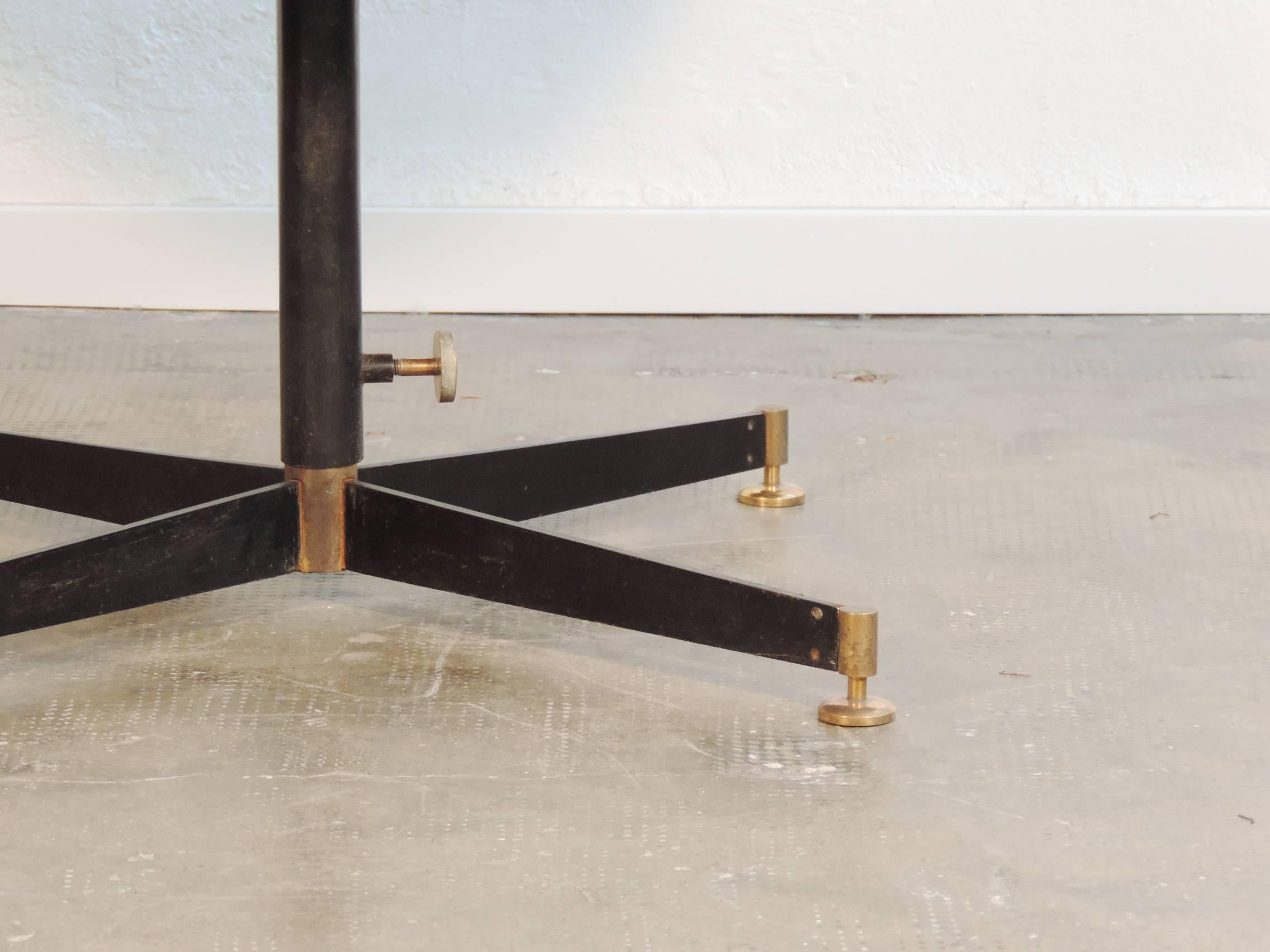 Splendid Ignazio Gardella adjustable low table for Azucena.

Can be lifted to become a dining table.