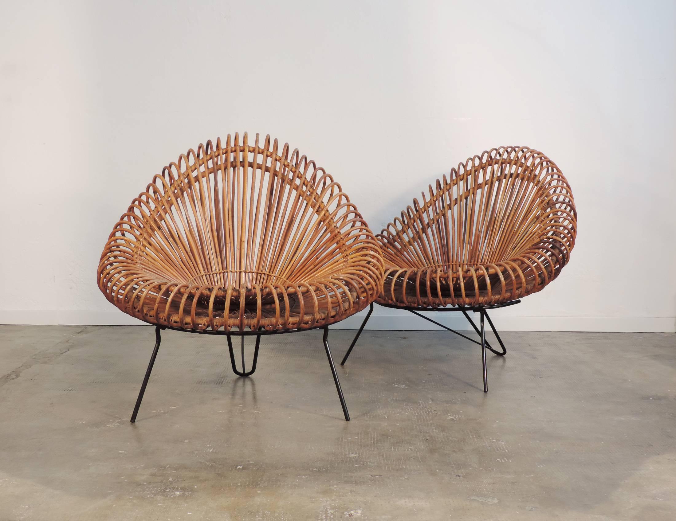 Splendid pair of Rattan armchairs attributed to Franco Albini.
At the moment there is no official documentation regarding the designer. These were manufactured in Italy and sold through La Rinascente.