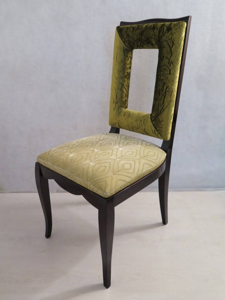 1930 French dining chairs. Eight chairs in mahogany stained black and green velvet. Renovated in fabric with a crumpled green velvet for the backrest, and with a velvet elasticized and embroidered for the sitting, always green combined. Wooden chair