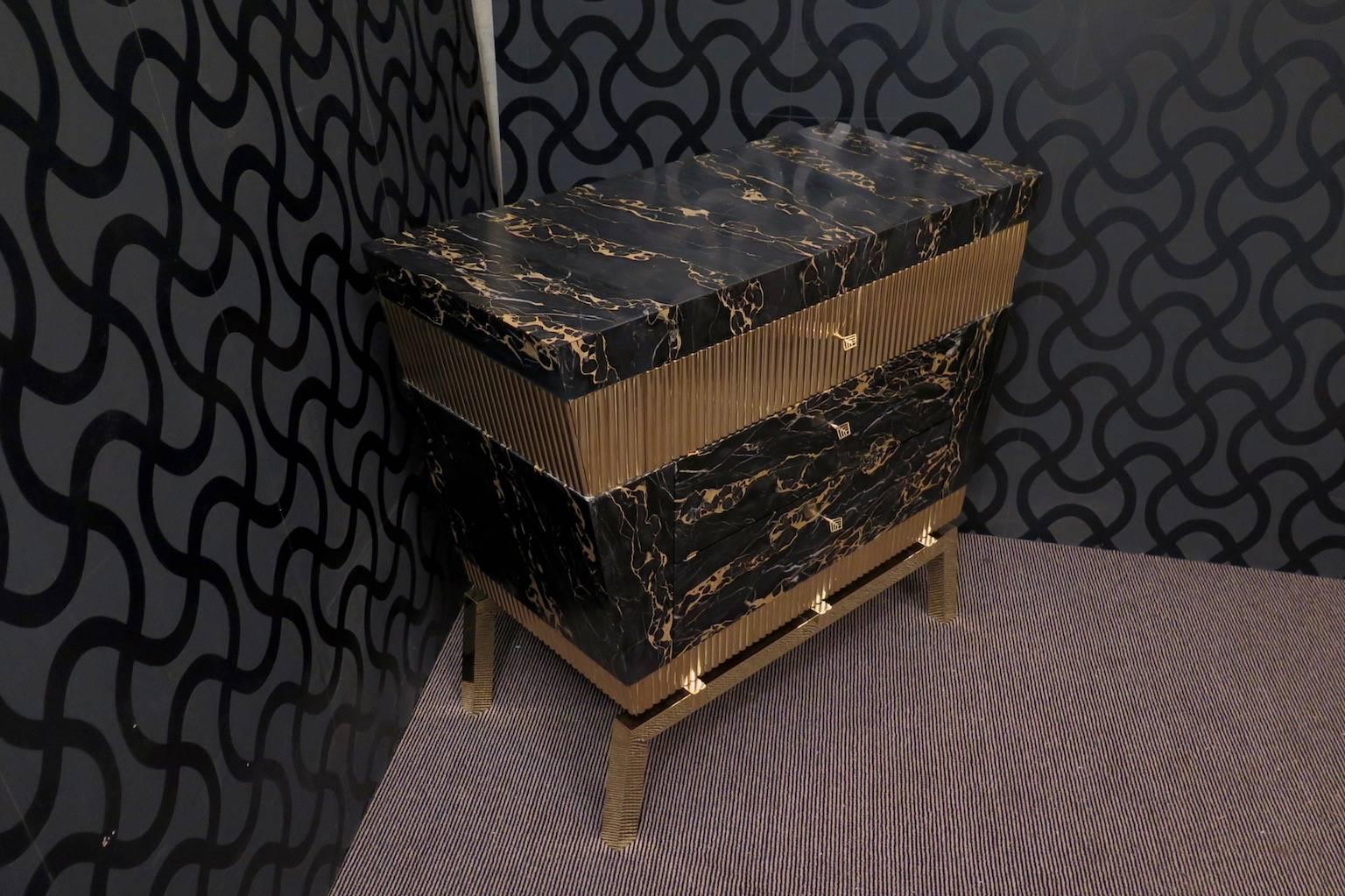 A magnificent commode created for the Hannauroma store. This commode has a very luxurious appearance, due the use of not common materials. Portoro marble and brass.

A new study design by 