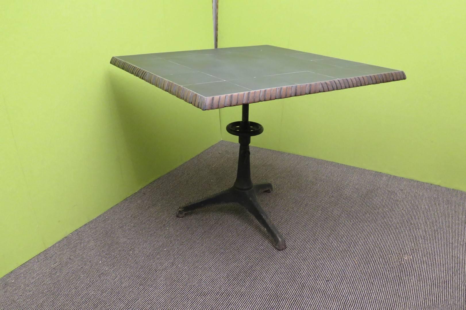 Industrial art table, top slate, wooden board, iron tripod of Carl Zeiss the leg has a screw that allows to raise and lower the table top.