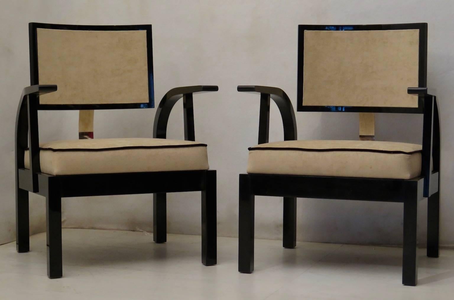 Pair of black lacquered wooden chairs with black velvet seat. The backrest is kept together with a metal band on which the signature is placed. It's design is very particular; innovator and modernist was this Hungarian architect. The Bauhaus was a