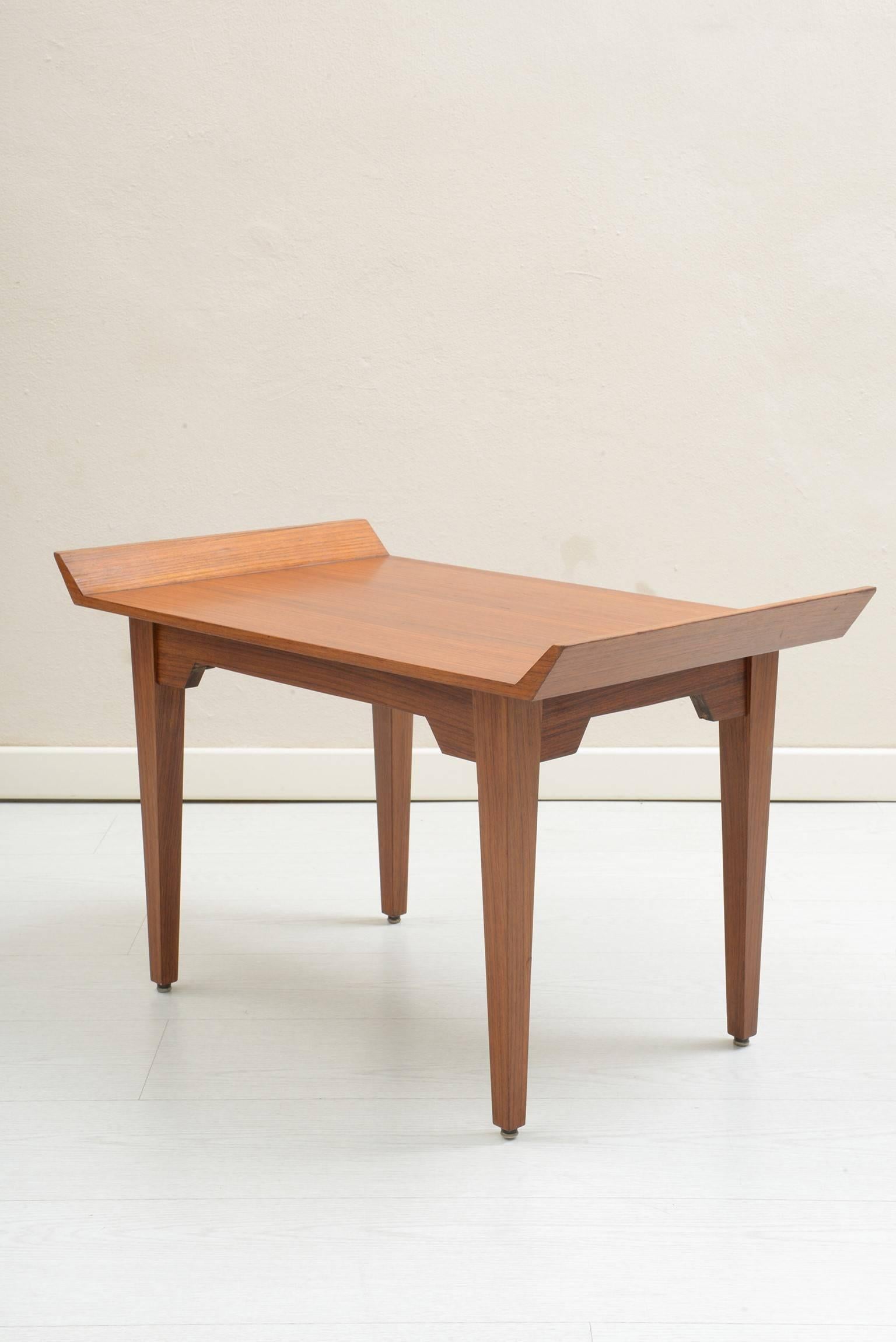 Elegant simple shaped teak wood pair of stools or side table.
Italy, 1960s.