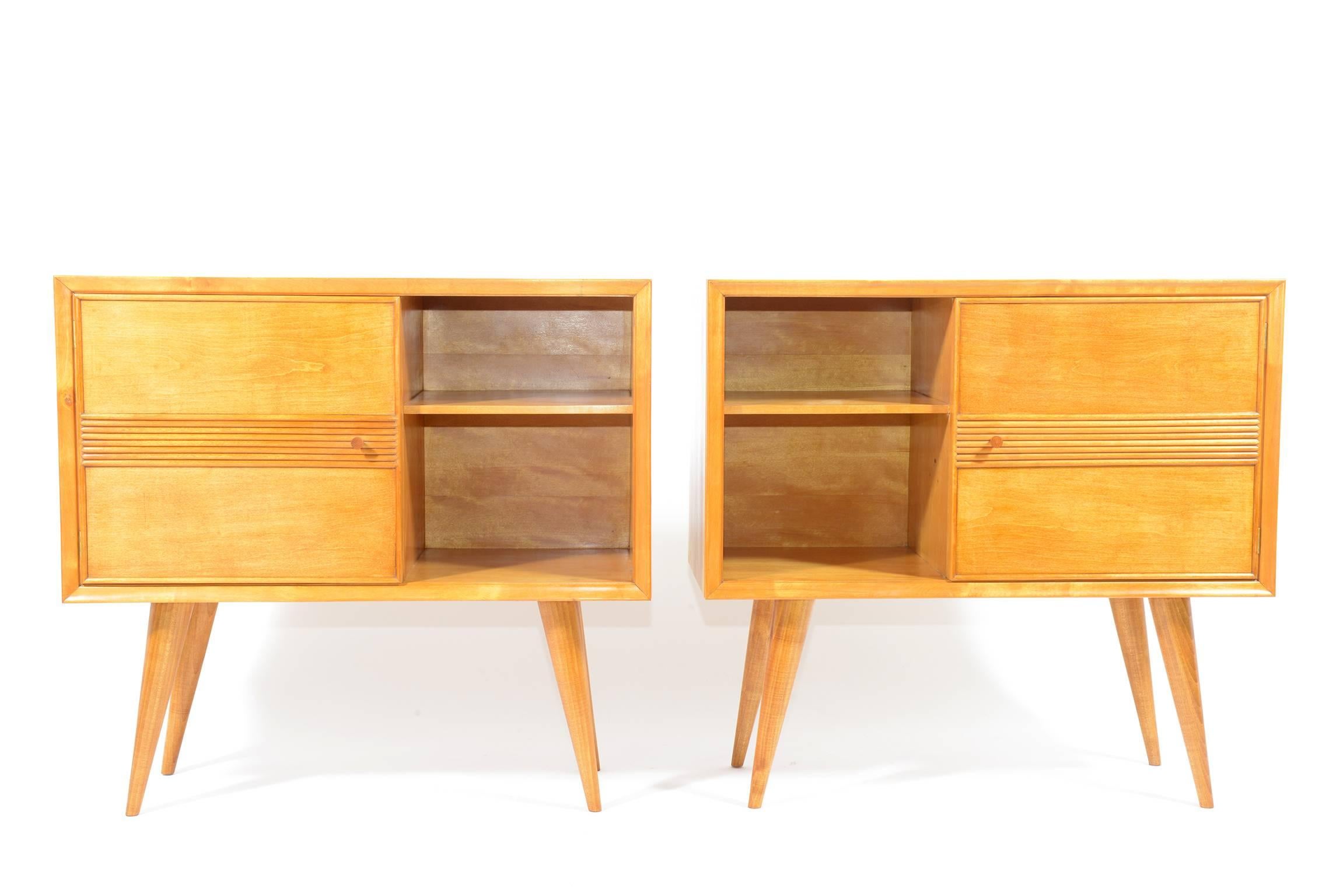 Pair of satin wood cabinet slender conic legs, doors with shelve inside.
This pair of cabinets belong to a holiday home projected by Pier Giulio Magistretti in the 1940.
 