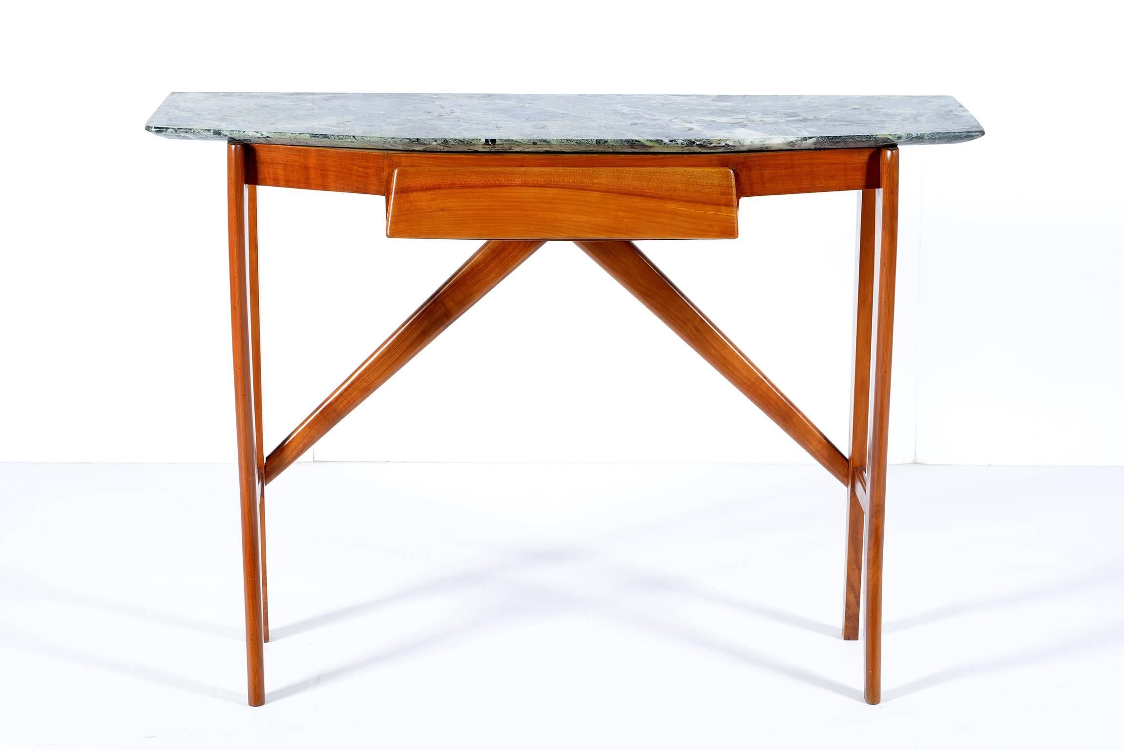 Pretty console with thin and slender solid wood structure, a drawer, Alps marble top,
Italy, 1950s.