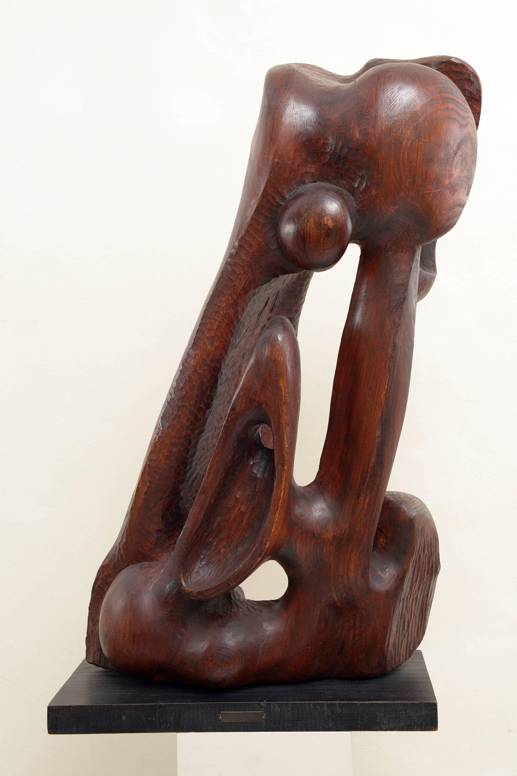 Solid big piece of wood sculptured, abstract subject, wood base to. Signed and dated 1967.