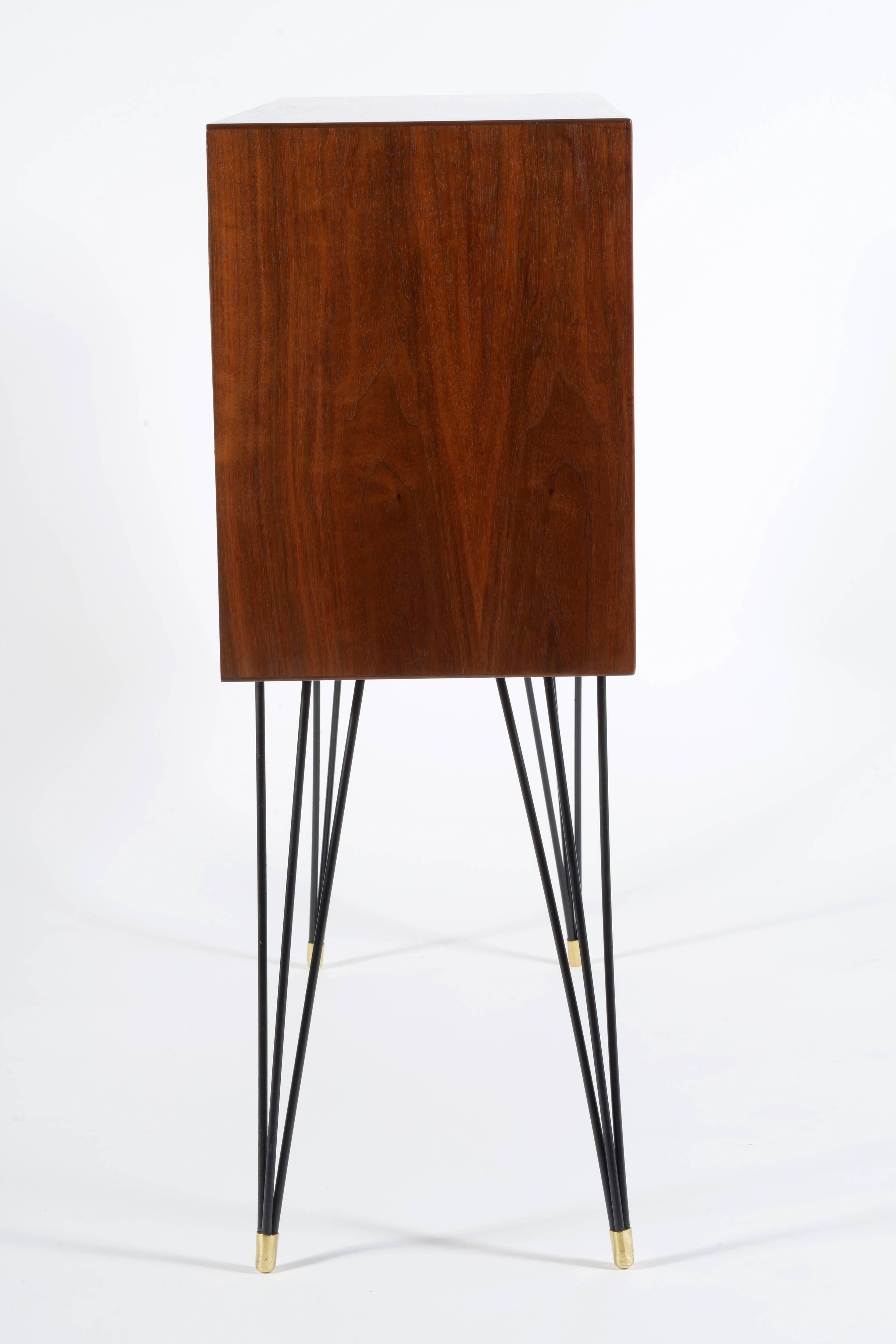 One  Slender Teak Wood Cabinet with Metal Legs, Signed In Good Condition For Sale In Firenze, Toscana
