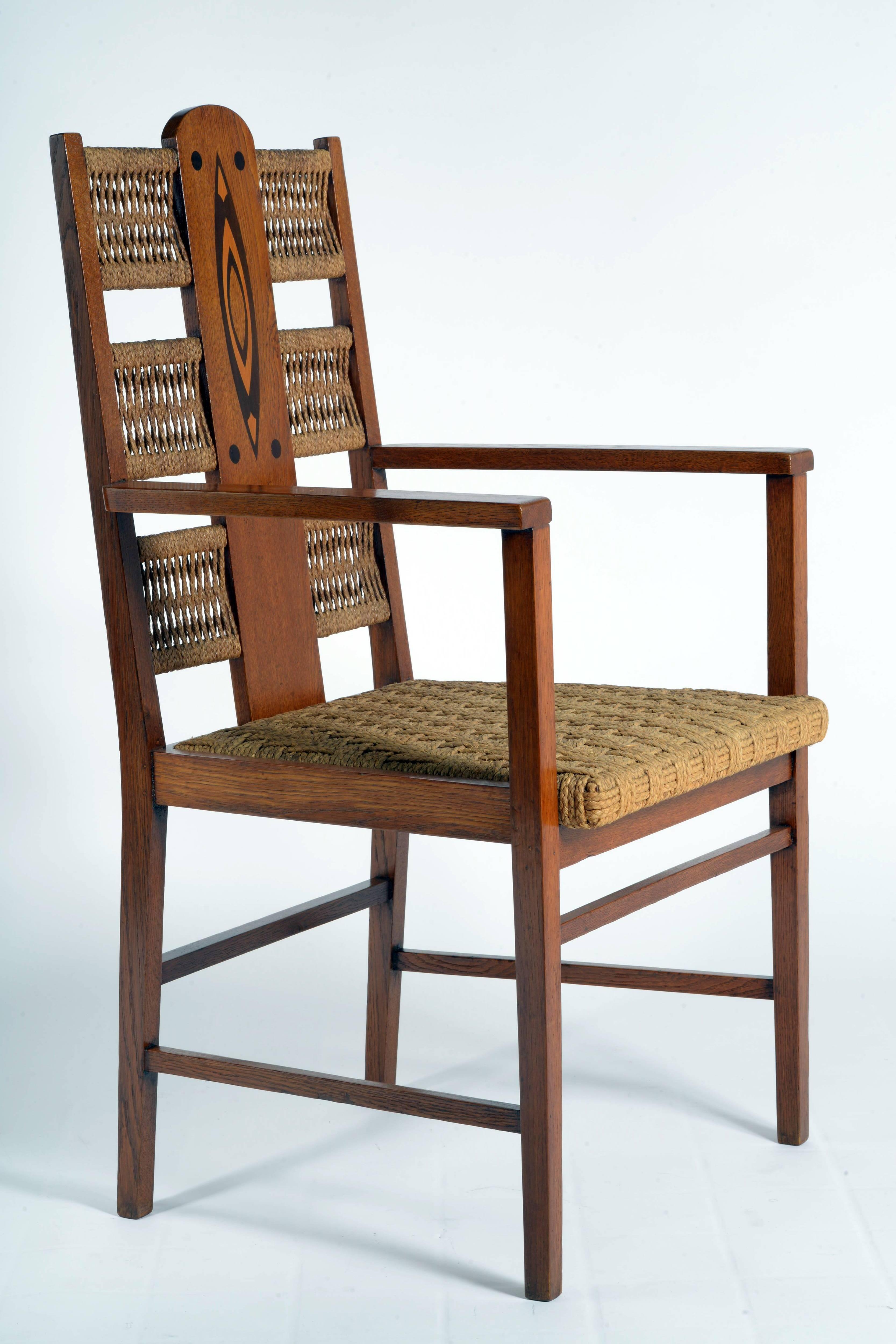 Beautiful pair of Art Nouveau armchairs with ebony and maples inlaid back and braided rope seat and back.
 
Franco Spicciani Pescia Lucca, Italy, 1905.

Bibliography reference: Il Mobile Liberty Italiano Editori Laterza Pag: 200.
