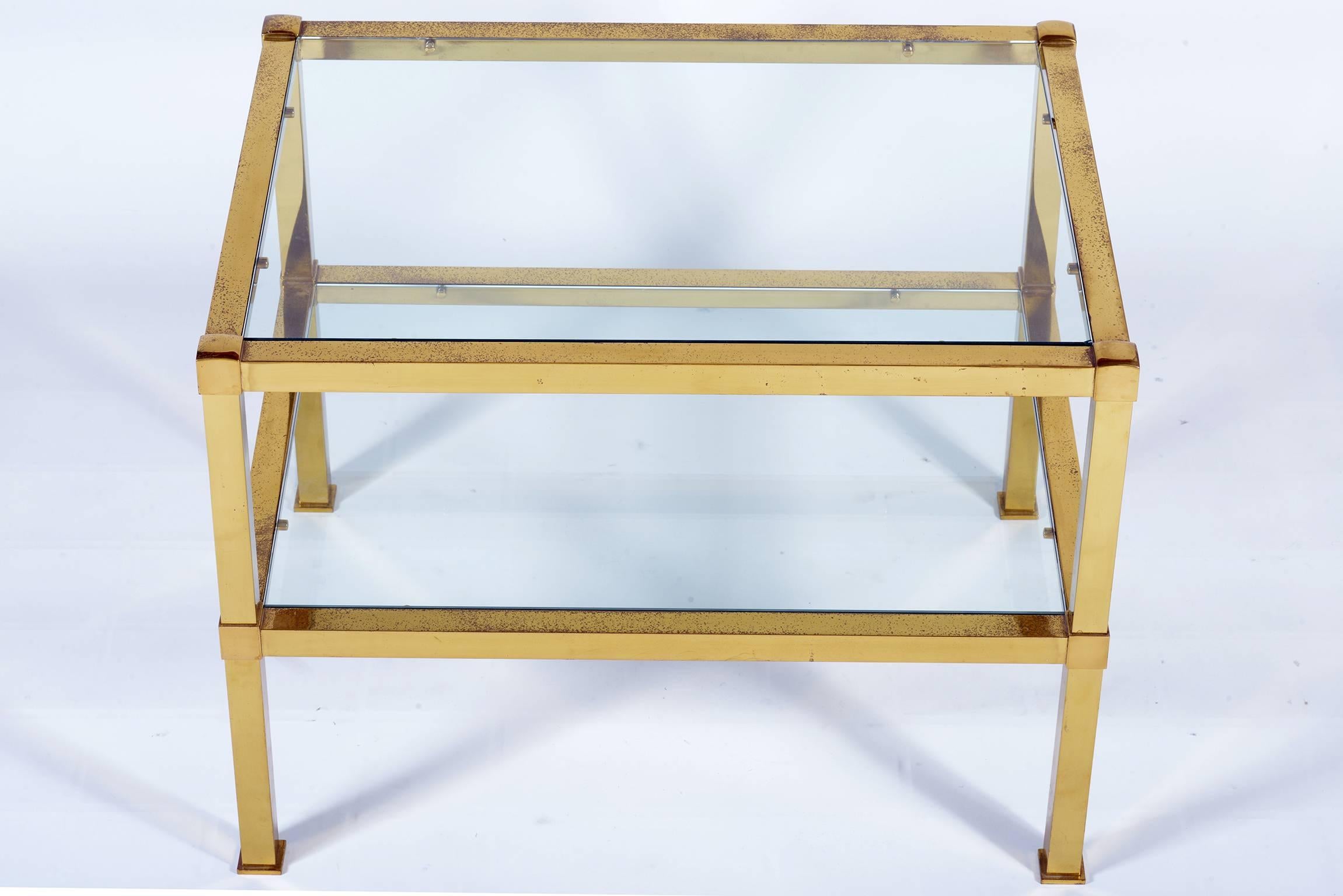Elegant double shelves brass big side table, top glass. Original interesting pretty patina.
That can be used like side table or nightstand.
   