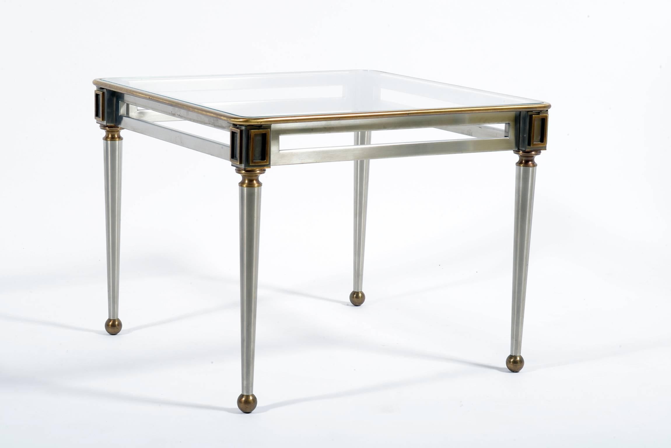Pair of Mid-Century steel and brass details elegant squared side table or nightstand, glass top.
Banci Florence, Italy, 1960s.
The price is for two.
      