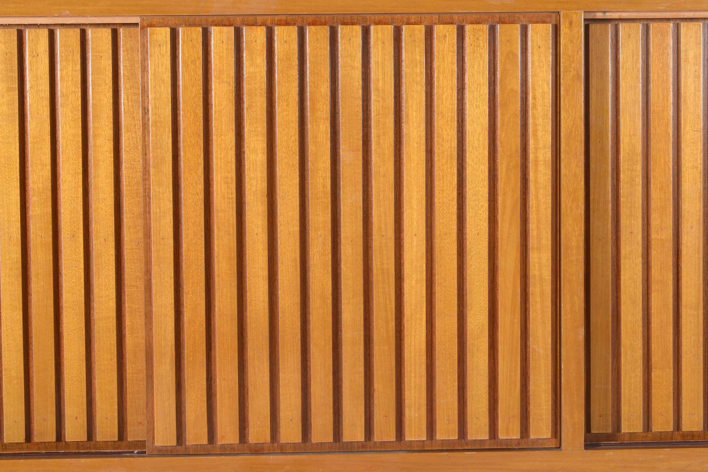 Mid-20th Century Mid Century modern  Italian sideboard  sliding grooved  Doors  , 1960's For Sale