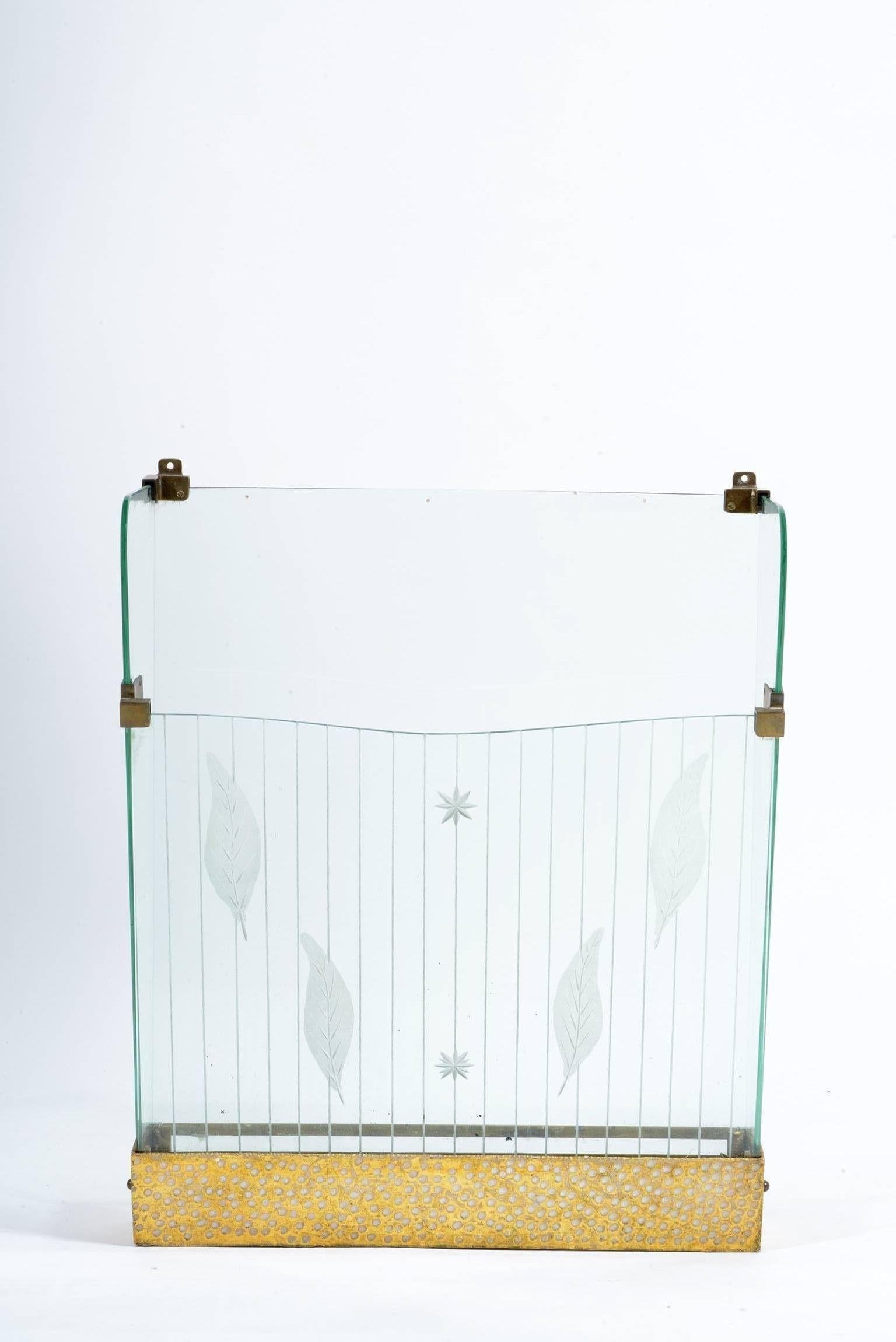 This umbrella stand is published on the crystal art book pag.14 and produced in the 1955.
Engraved beveled and sand blast decorated crystal, brass structure.
On the bottom, the metal box can be extracted to empty the water.
Two brass hook to be
