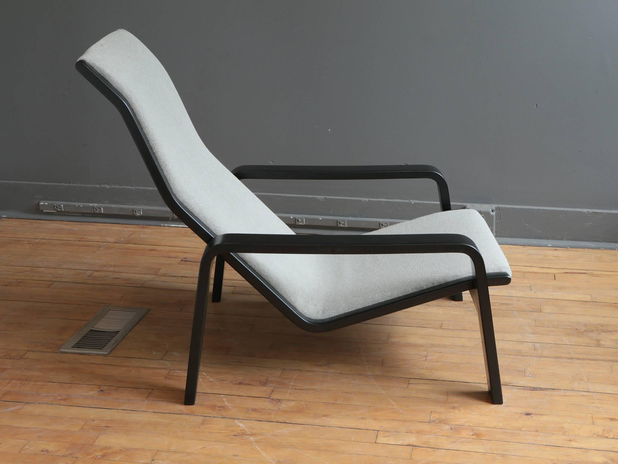 An adjustable lounge chair designed by Tapio Wirkkala for Stending, circa 1960s or 1970s. Features an ebonized ash frame with upholstered grey sling. 

A great form that is also comfortable.