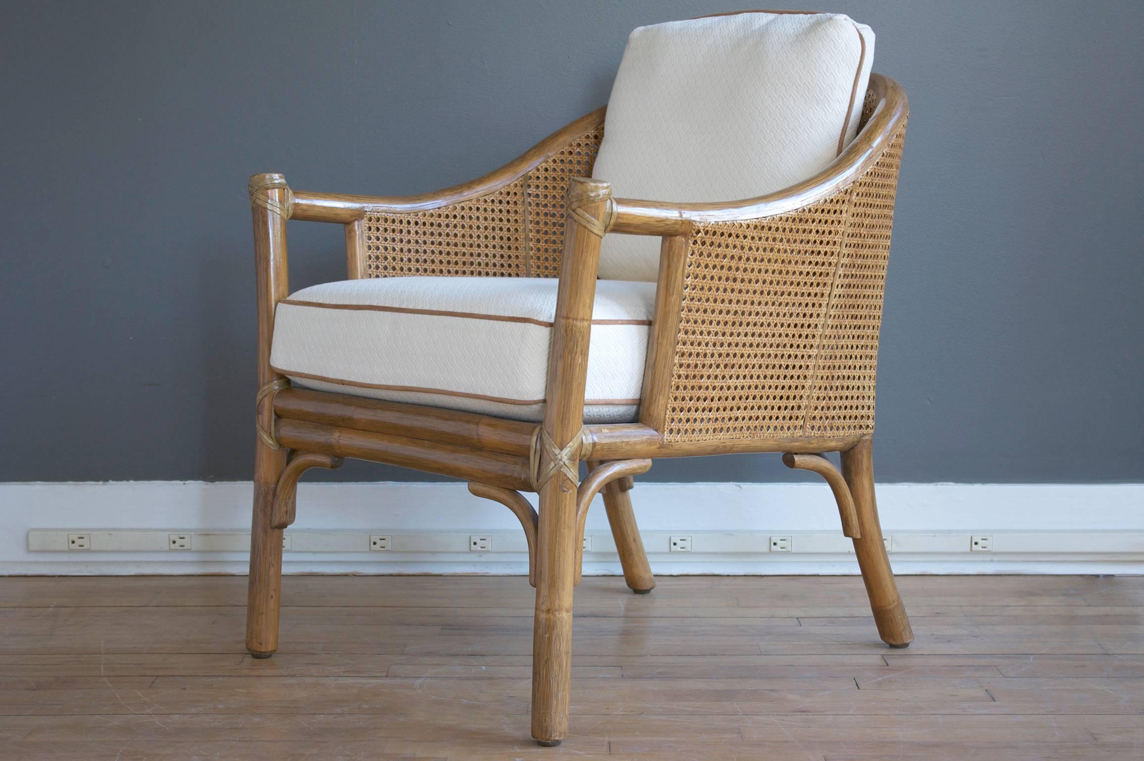 Mid-Century Modern Pair or Rattan Lounge Chairs and Ottomans by McGuire