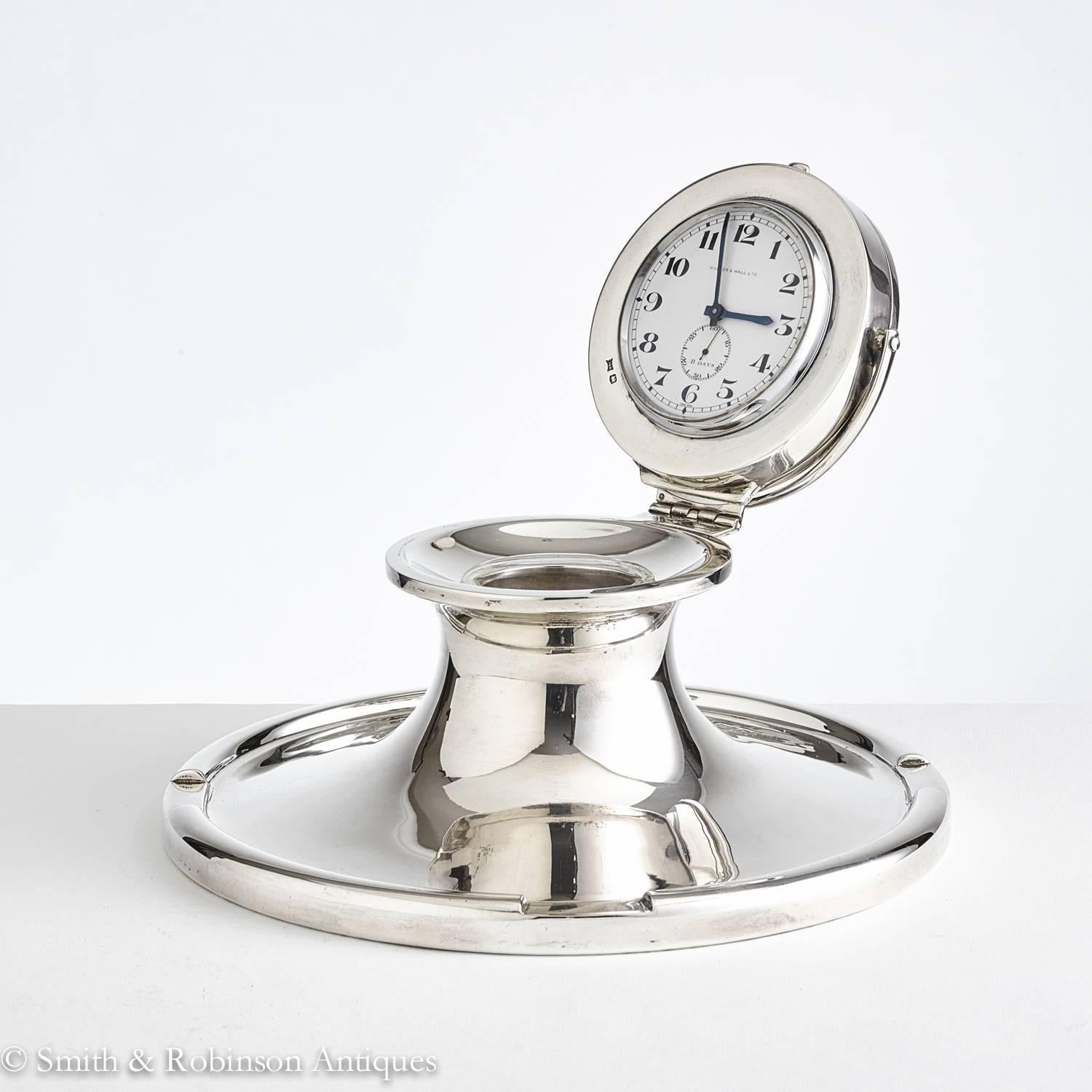 Large early 20th Century Nautical Capstan clock inkwell, dated 1914 maker Walker & Hall.
The clock face can be shown in two different positions open or closed. 
Alternatively, if preferred, it can be closed with the clock face hidden.
There is a