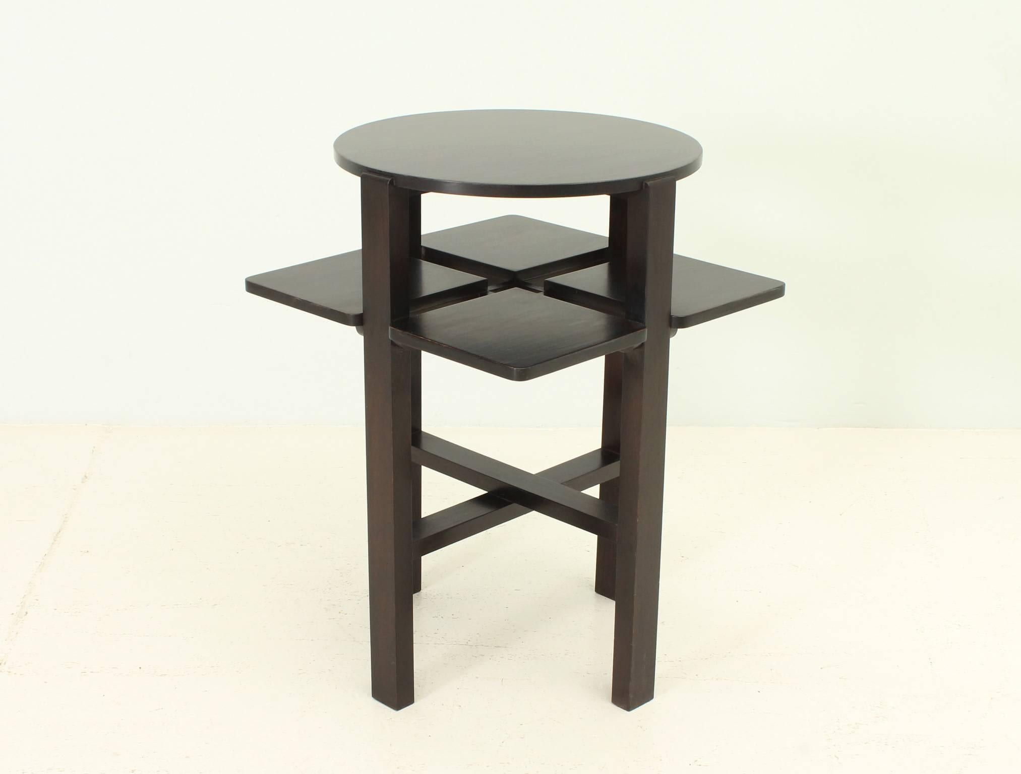 Domino table originally designed in 1911 by Charles Rennie Mackintosh for the Glasgow tearooms, this is a re-editon from 1986 by BD, Barcelona. Black stained oak wood.