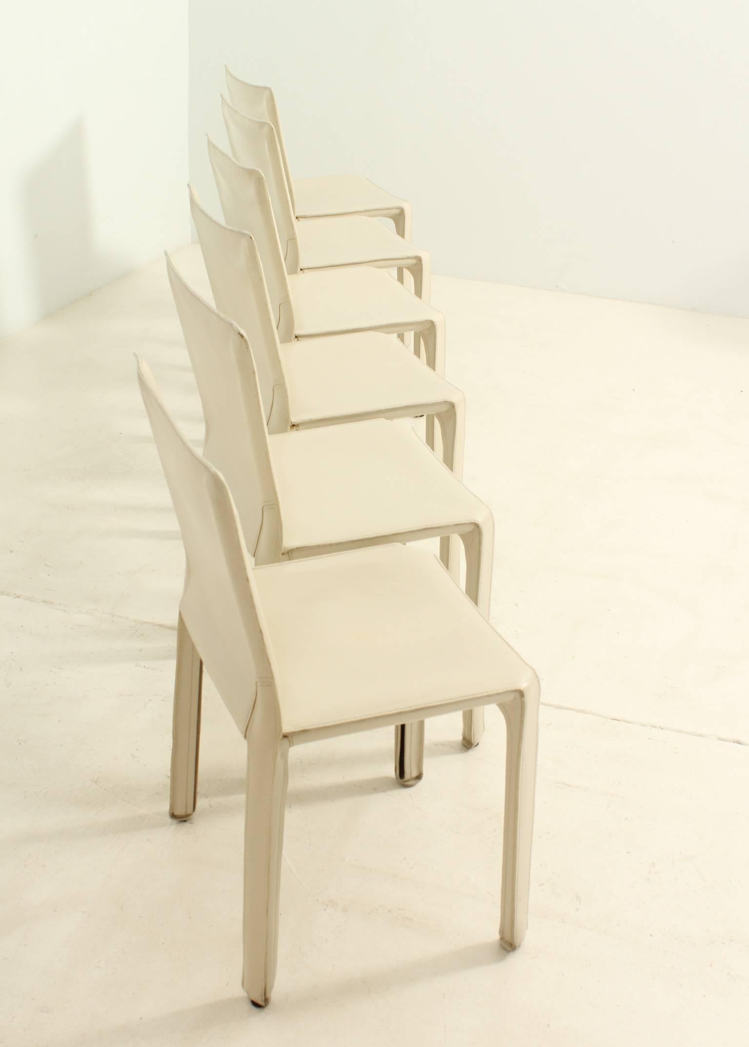Set of six Cab chairs designed in 1977 by Mario Bellini for Cassina, Italy. Steel frame covered with off-white leather.