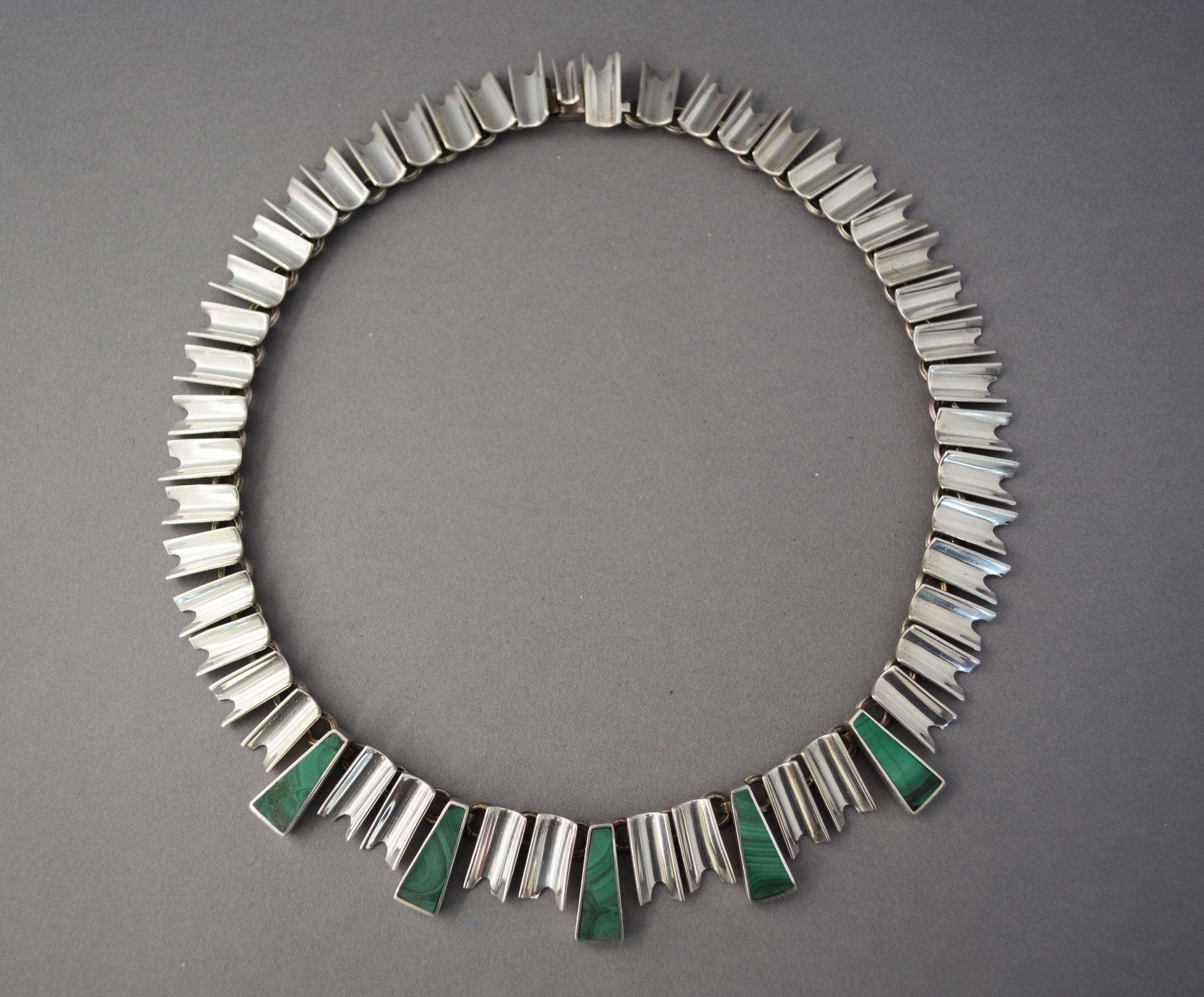 Taxco sterling necklace with a strong Art Deco influence. This has five elongated trapezoids inset with malachite. The necklace is 18.5