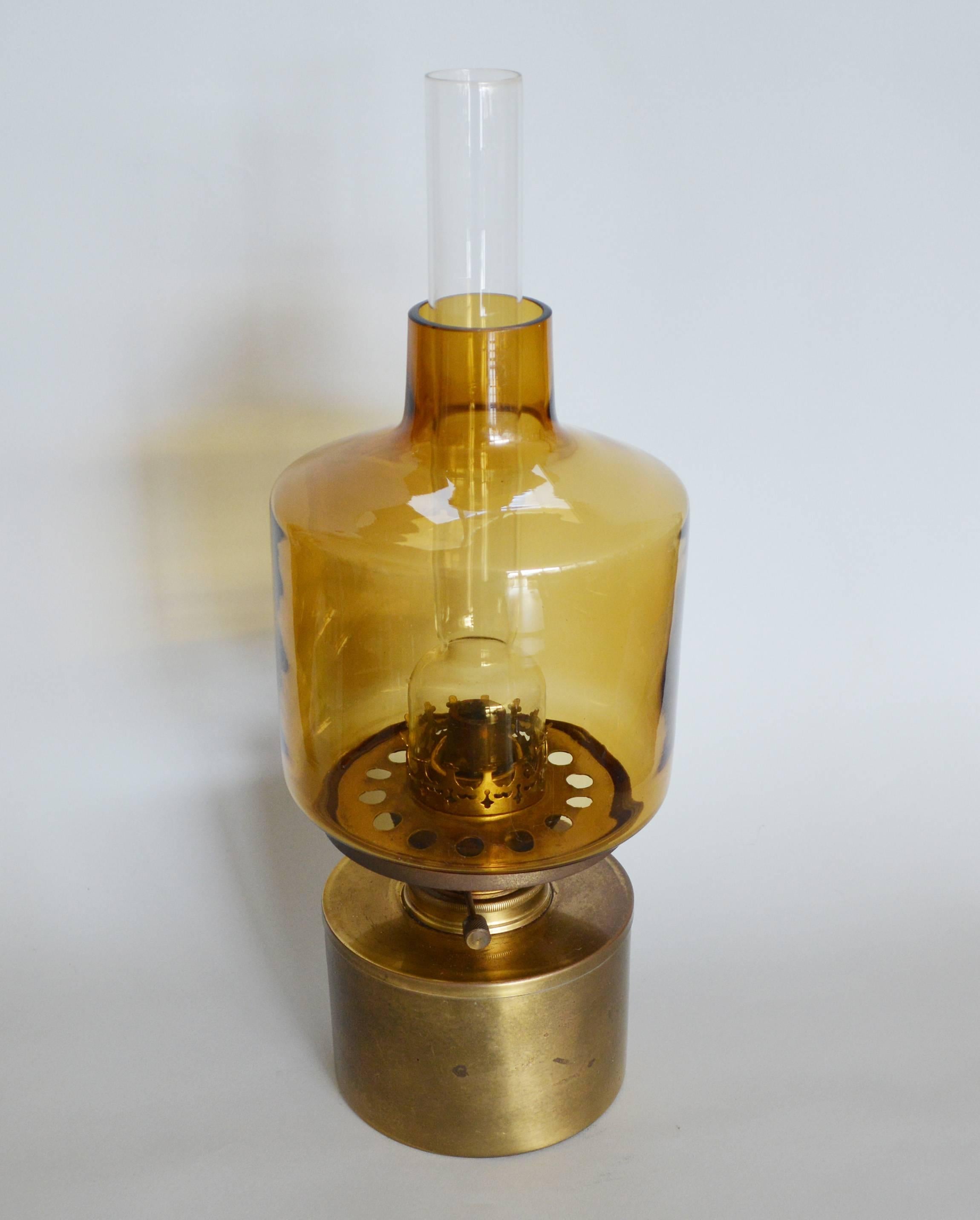 Oil lamp designed by Hans-Agne Jakobsson for AB Markaryd. This is the large L-47 model. The lamp is in working condition.