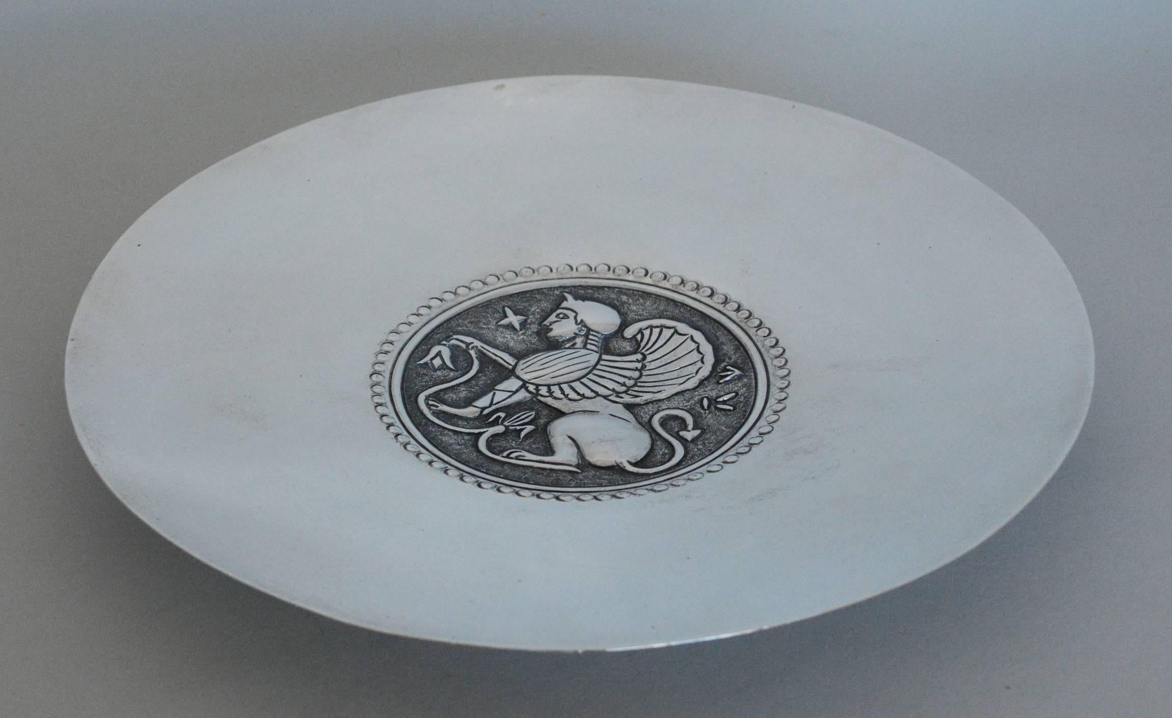 830 sliver dish by renowned jeweler and silversmith G. Stephanides Son and Company of Cyprus. The motif on this dish is taken from an ancient Cyprus coin.