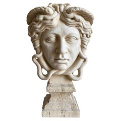 Head of Medusa carved from white Carrara marble—made in Italy